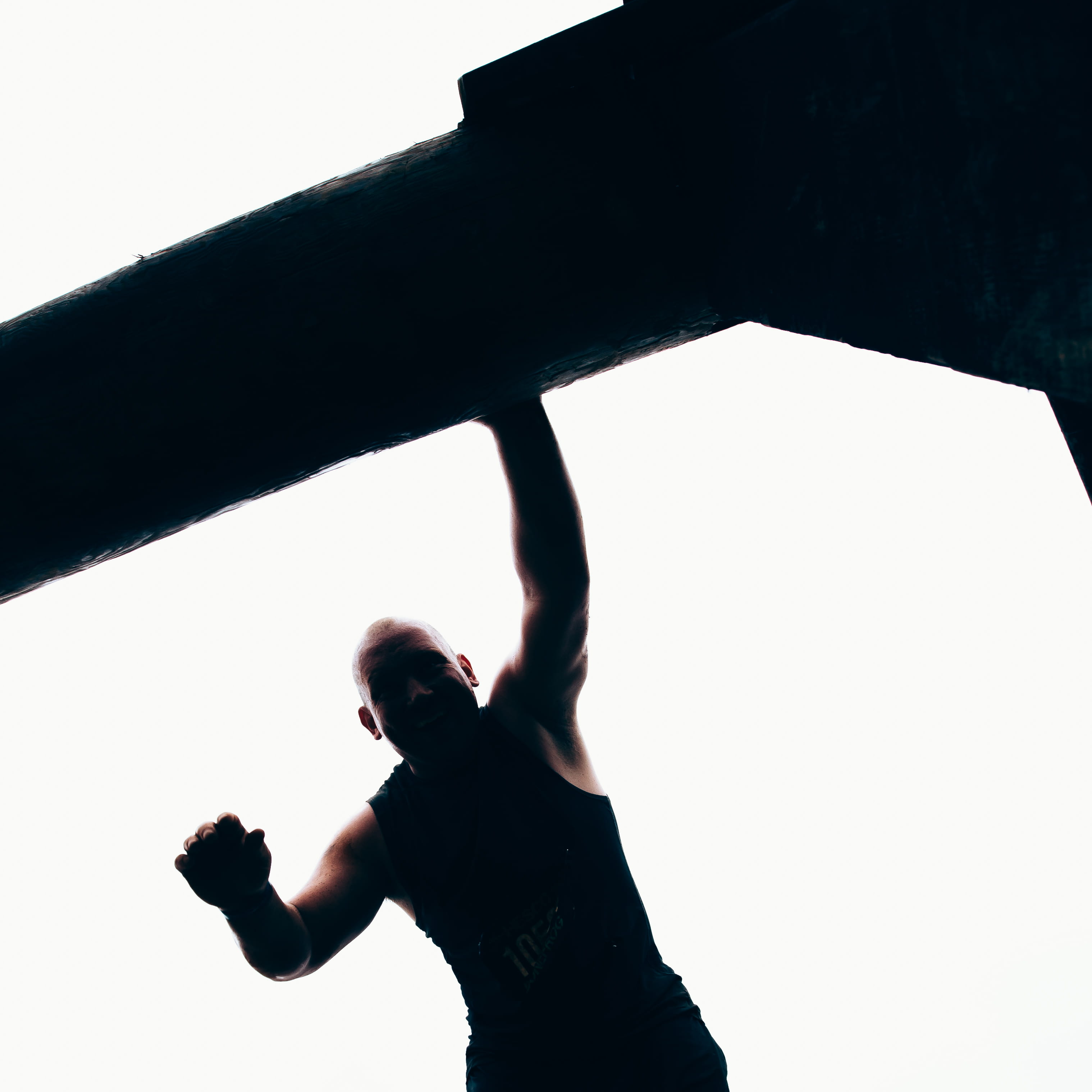 low angle view, patience, standing, day, one person, atlanta, men, leap, arms raised, 2K, outdoors, copy space, chance, jump, leisure activity, dark, clear sky, Phone HD Wallpaper