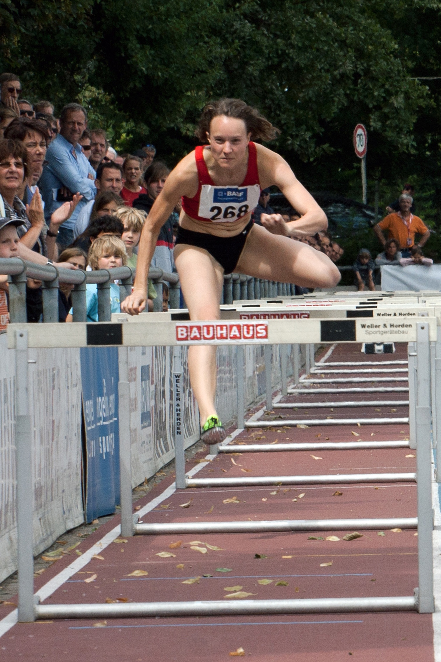real people, adult, women, hurdles, sport, day, men, 1080P, people, athletics, full length, competition, text, front view, crowd, group of people, young adult, Phone HD Wallpaper