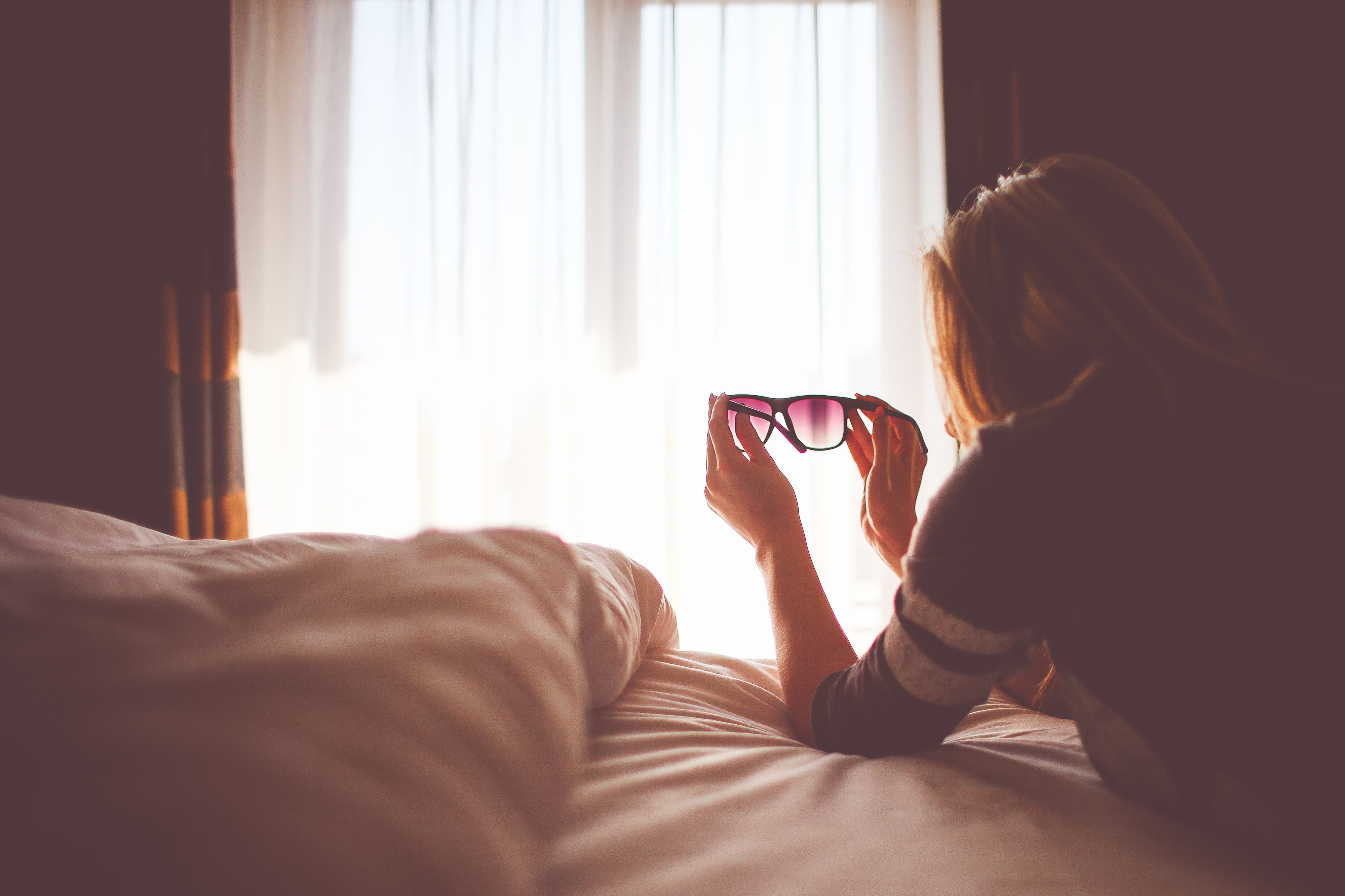 technology, hipster, indoors, lifestyles, bed, hairstyle, glasses, scene, black, window, bedroom, inside, 4K, adult, sunglasses, succeed, pillow, domestic room, HD Wallpaper