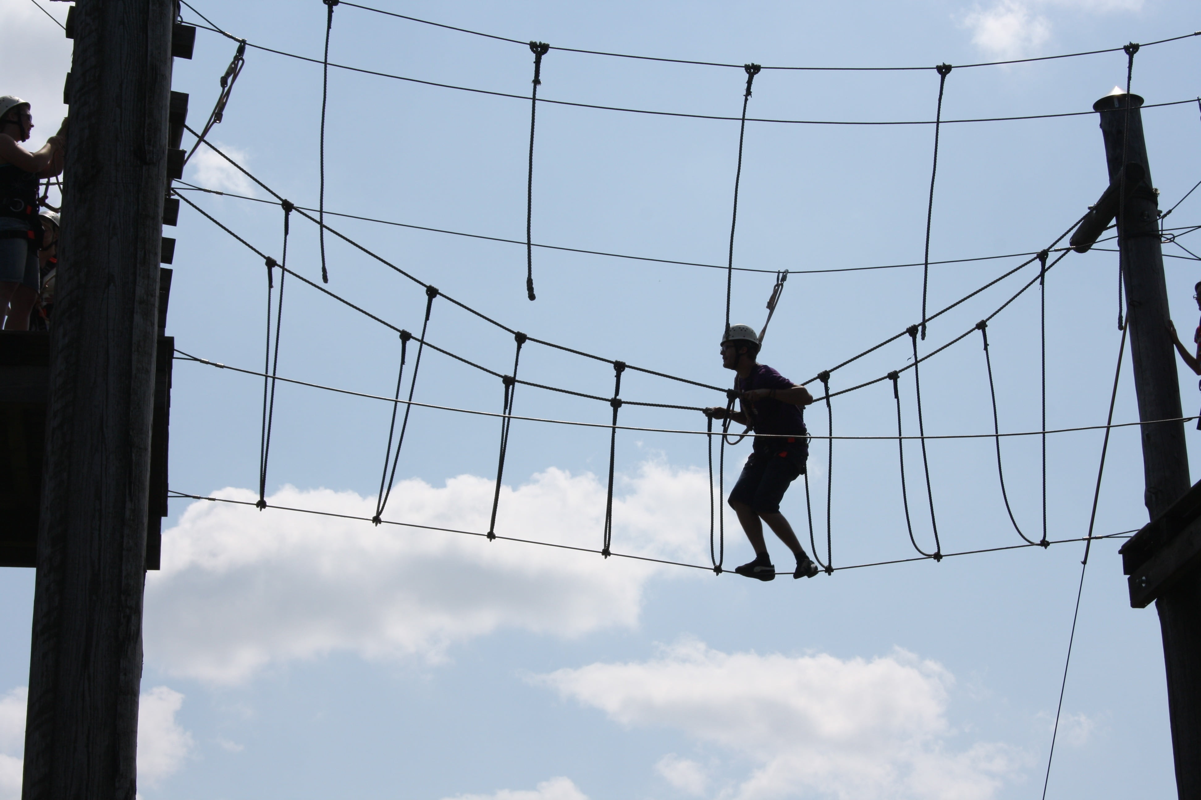 high ropes course, outdoors, occupation, hanging, warning sign, climbing garden, experiential education, risk, low angle view, bridge, balance, sign, person, HD Wallpaper