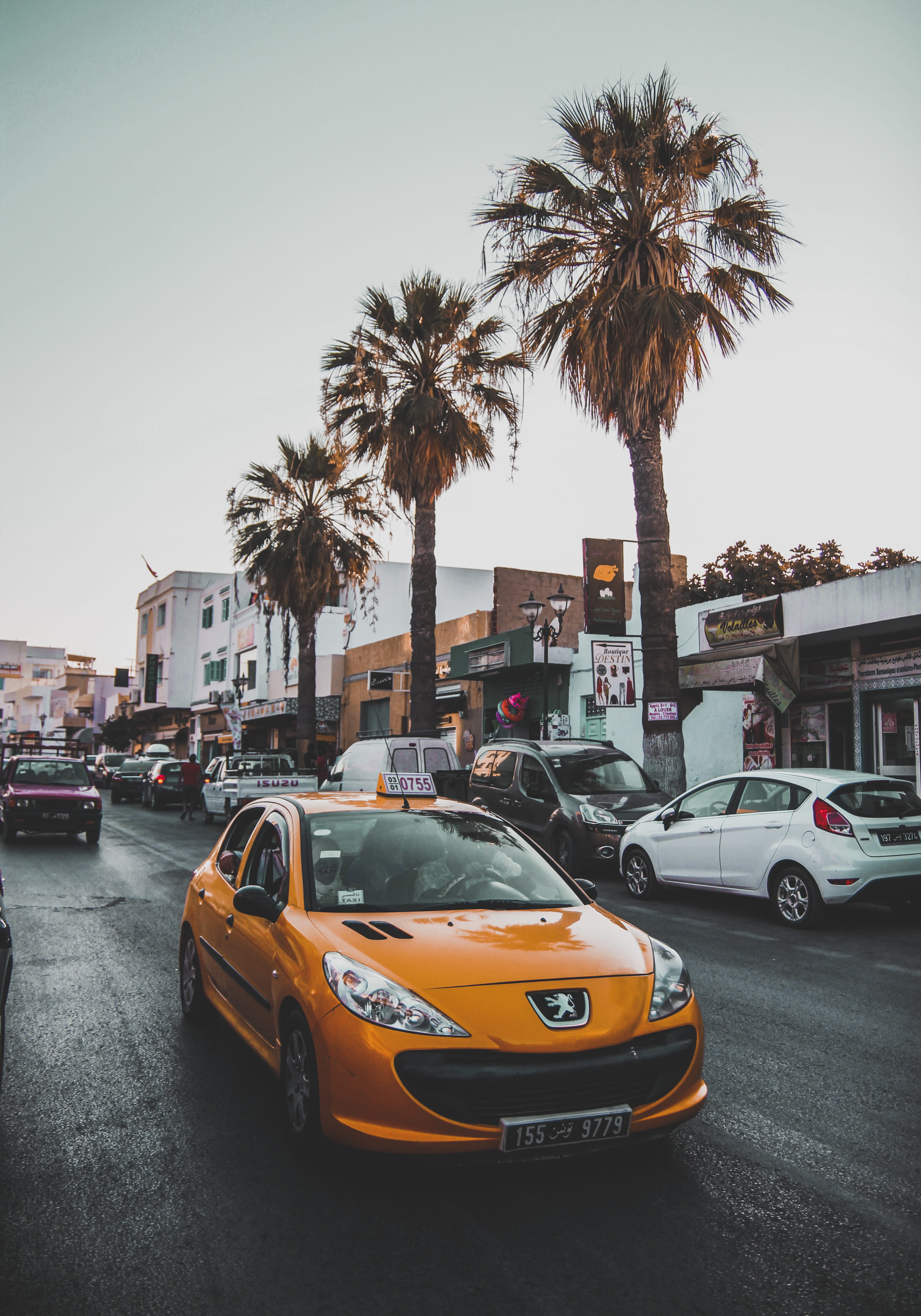 orange, mode of transportation, taxi, parking lot, car, nature, land vehicle, built structure, tunisia, sedan, motor vehicle, transportation, sports car, Phone HD Wallpaper