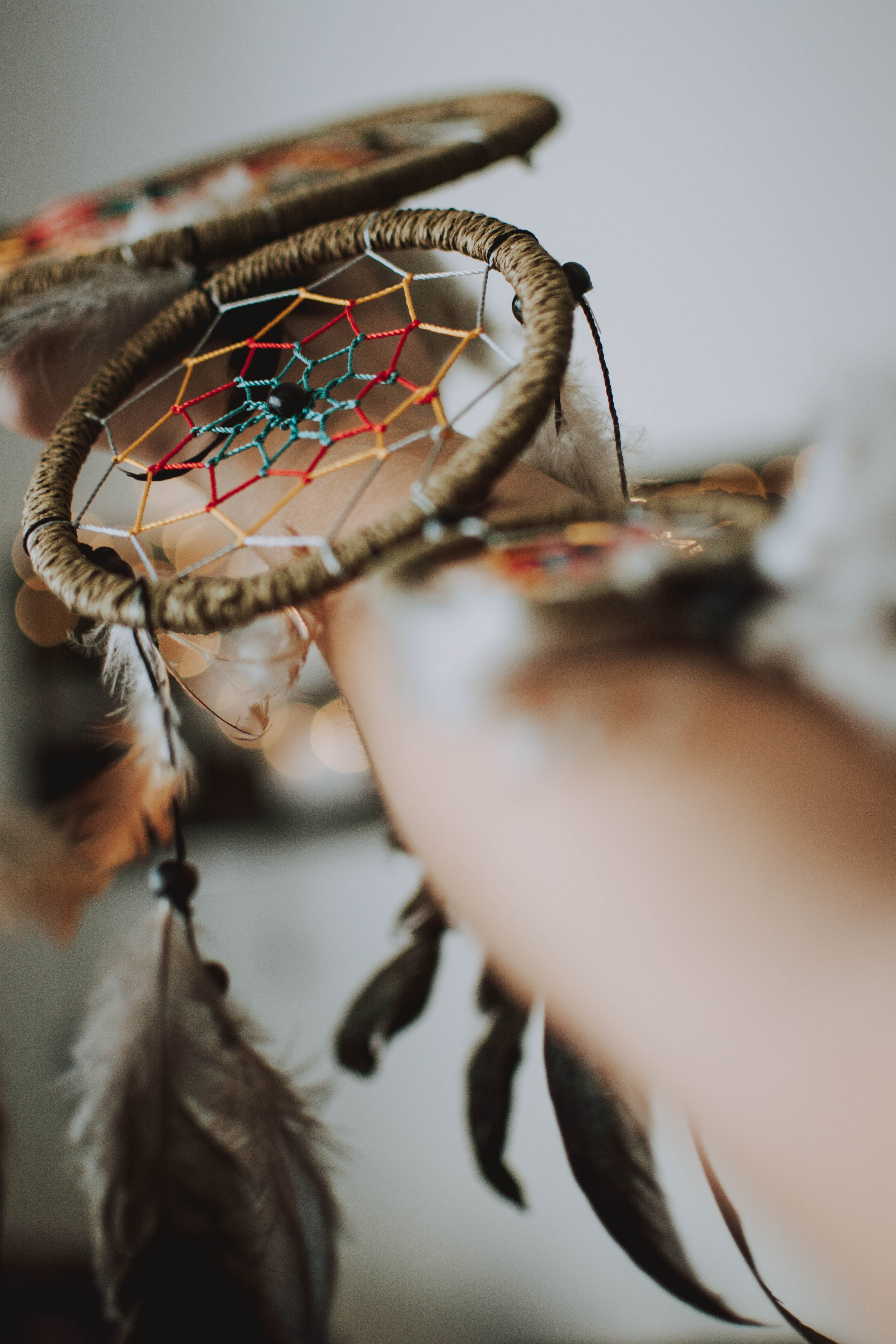 dreamcatcher, indoors, art and craft, history, craft, the past, day, feathers, close-up, feather, no people, minute hand, nature, selective focus, accuracy, Phone HD Wallpaper