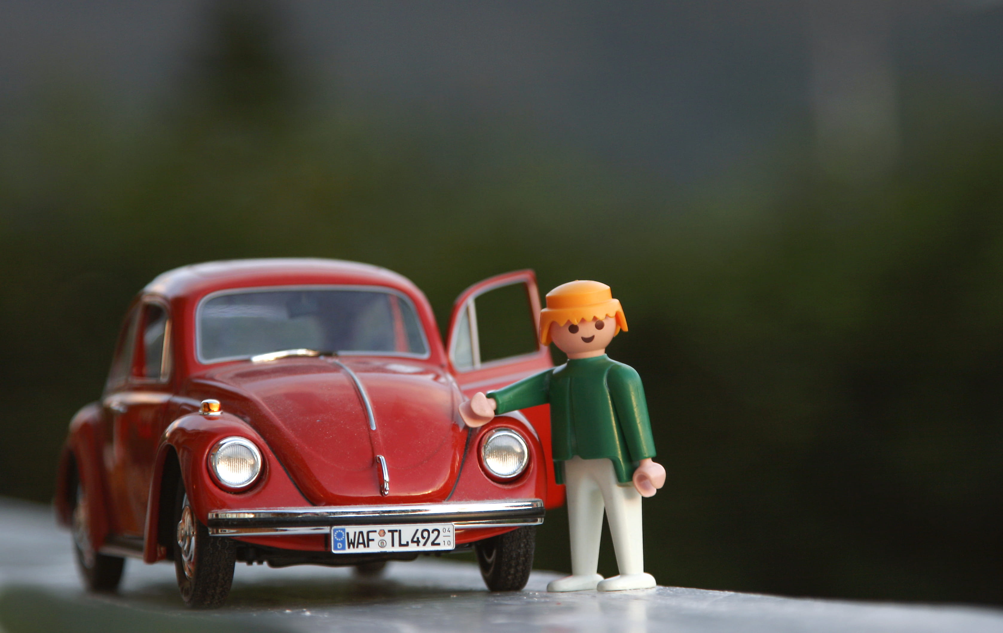 men, males, full length, child, smile, one person, red, standing, kids, representation, toy, day, volkswagen, volkswagen beetle, toy car, playmobil, mode of transportation, HD Wallpaper