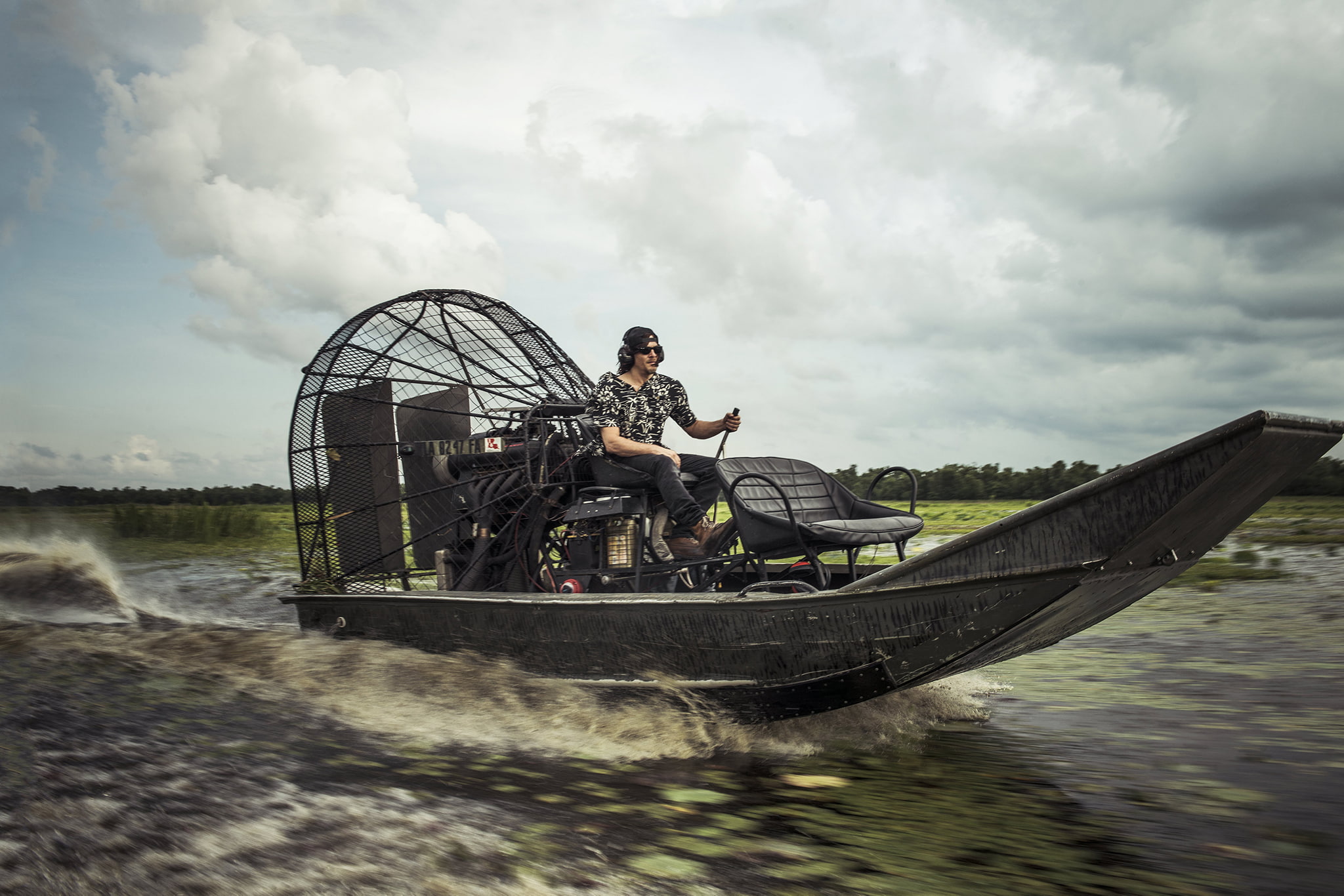 river, cap, Michael Muller, actor, screw, glasses, 1080P, boat, air, headphones, clouds, walk, Norman Reedus, photo, Red Bulletin, propeller, speed, landscape, HD Wallpaper