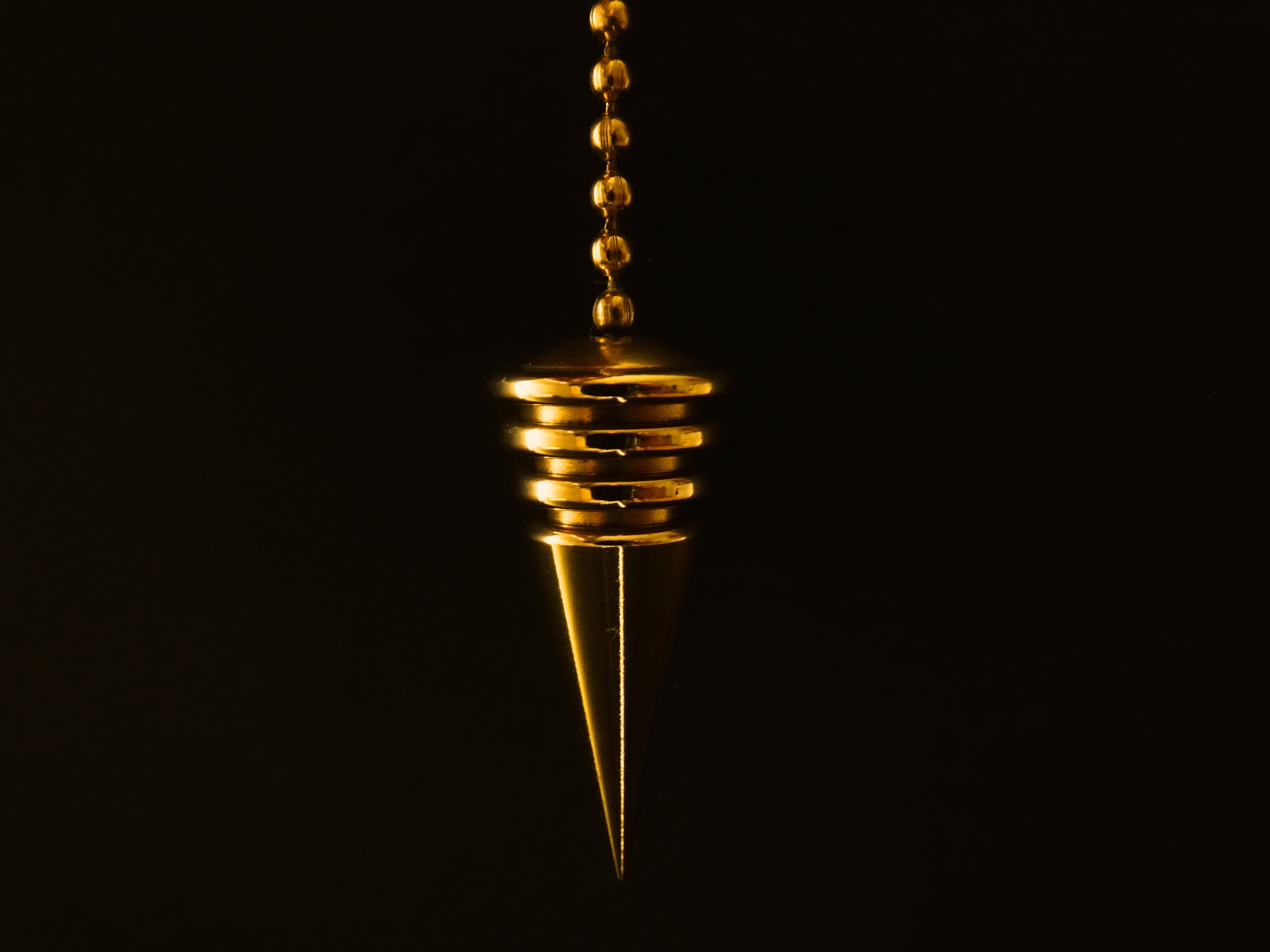 cone, pendulum, single object, chain, education, close-up, pen, studio shot, copy space, 5K, finance, black background, gold, black color, necklace, luxury, HD Wallpaper