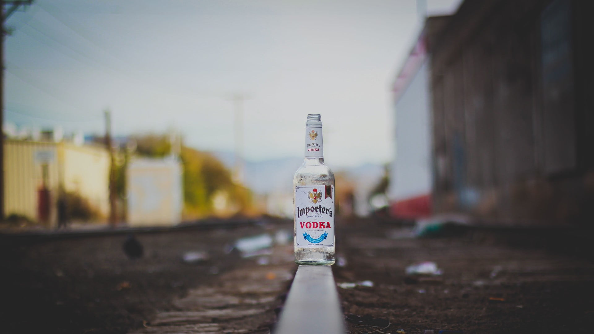 close-up, no people, sky, bottles, vodka, bottle, white, architecture, sign, day, 1080P, city, building, selective focus, built structure, black, labeled, HD Wallpaper