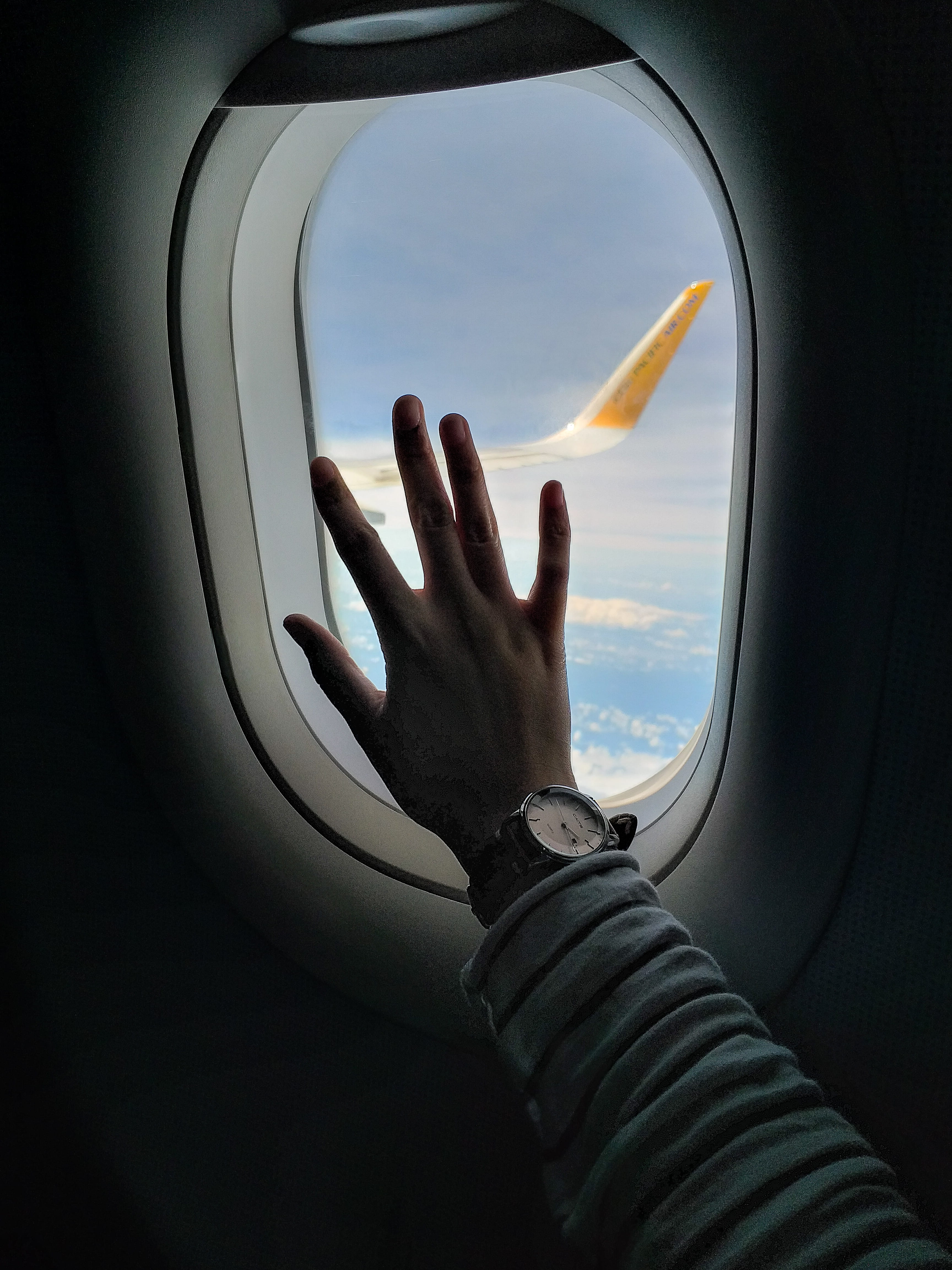 transportation, one person, journey, leisure activities, window, light, flying, glass - material, aircraft, porthole, nature, human hand, adventure, air vehicle, Phone HD Wallpaper