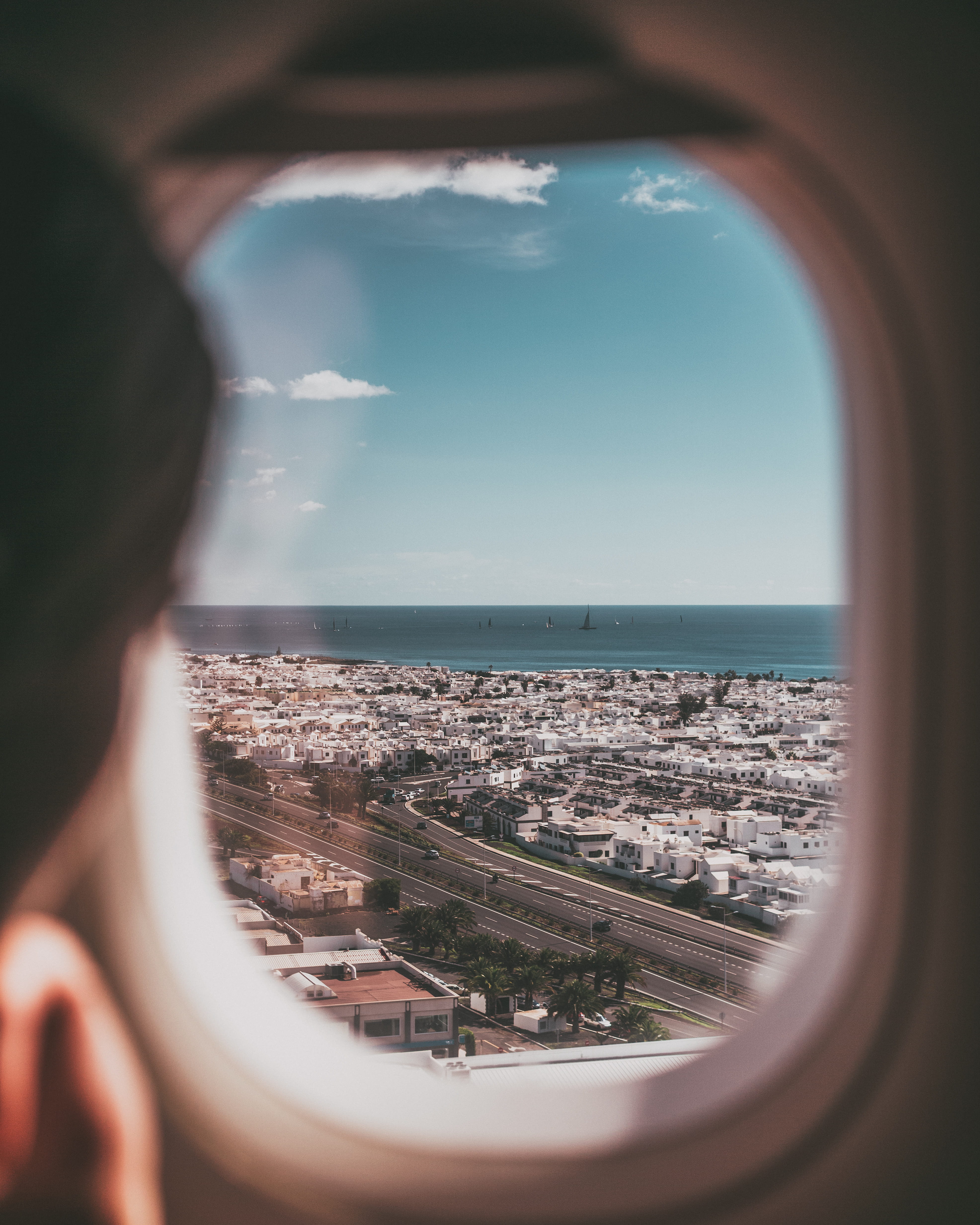 outdoors, human, near, horizon over water, looking at view, nature, city, scenery, airplane, grey, sea, crowded, aerial view, window shade, home decor, Phone HD Wallpaper