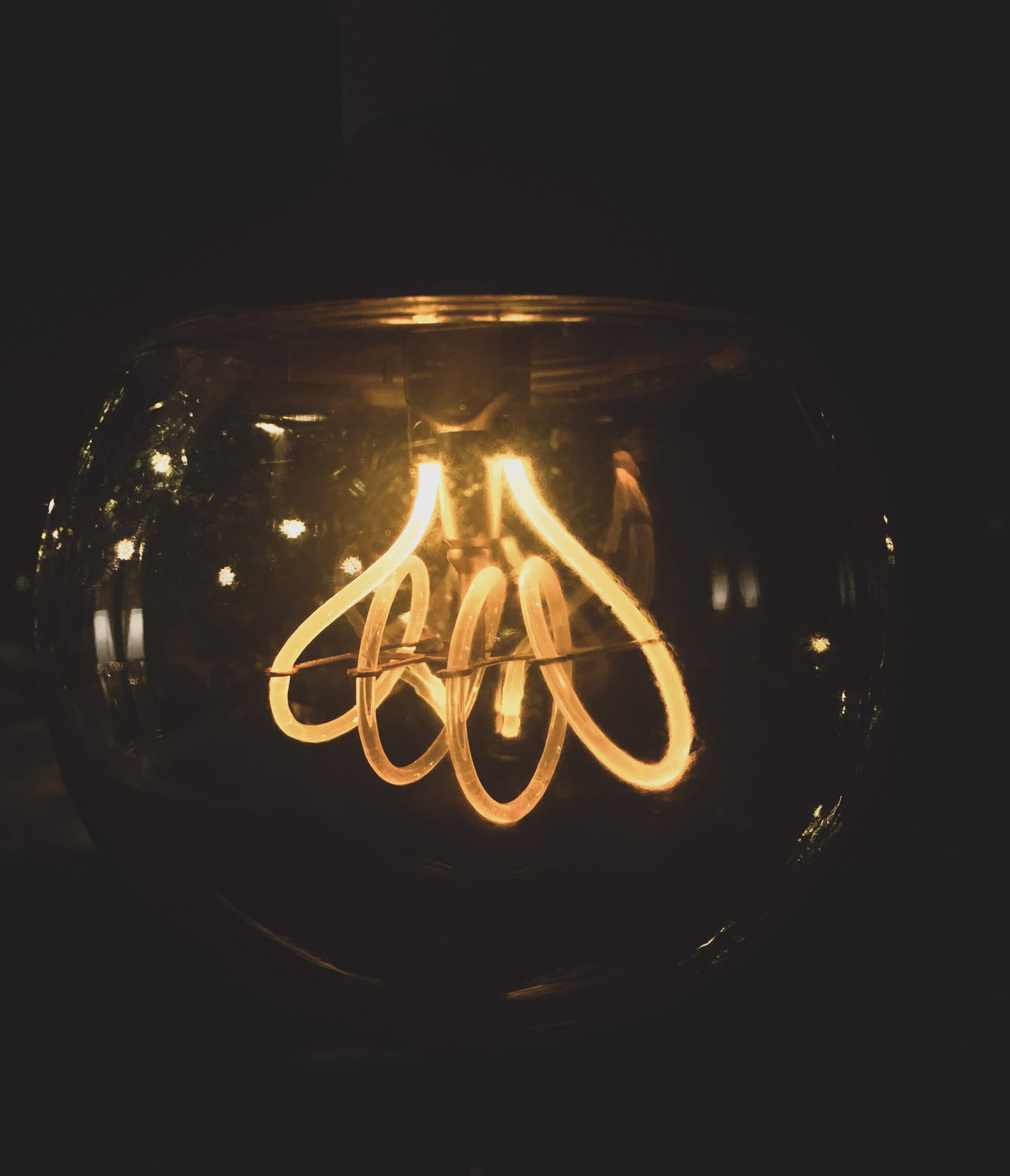light bulb, close-up, glowing, indoors, filament, transparent, light - natural phenomenon, studio shot, glass - material, no people, lighting, headlight, Phone HD Wallpaper