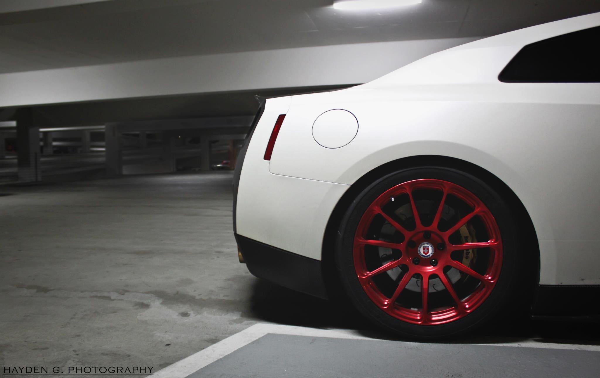 close-up, architecture, Nissan GT-R, motor vehicle, wheel, instrument, gray, stationary, parking lot, 1080P, road, land vehicle, cluster, no people, red, HD Wallpaper