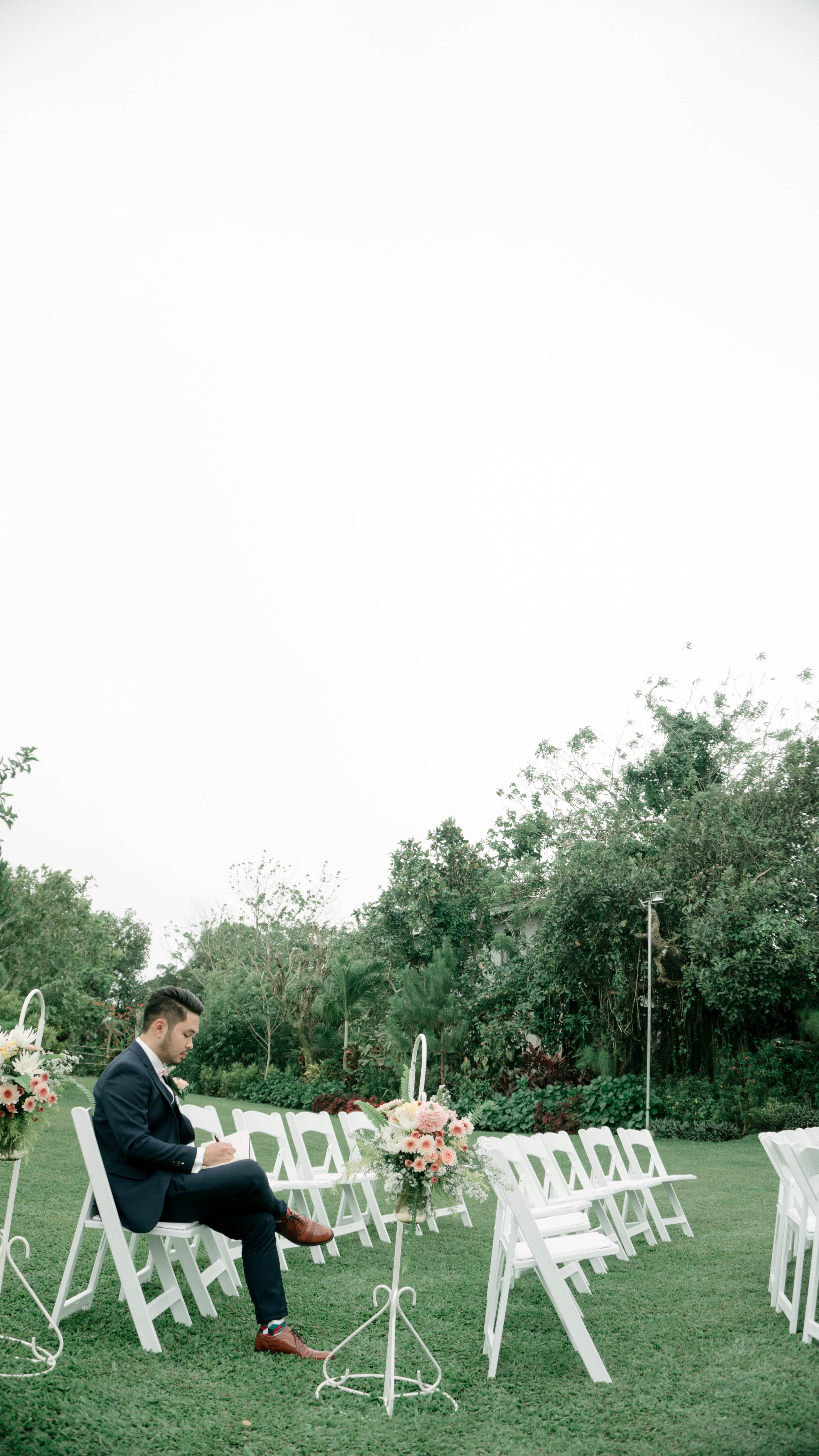 glass, groom, sitting, male, copy space, nature, real people, chair, outdoors, casual clothing, vow, people, young men, day, writing, plant, sky, clear sky, Phone HD Wallpaper