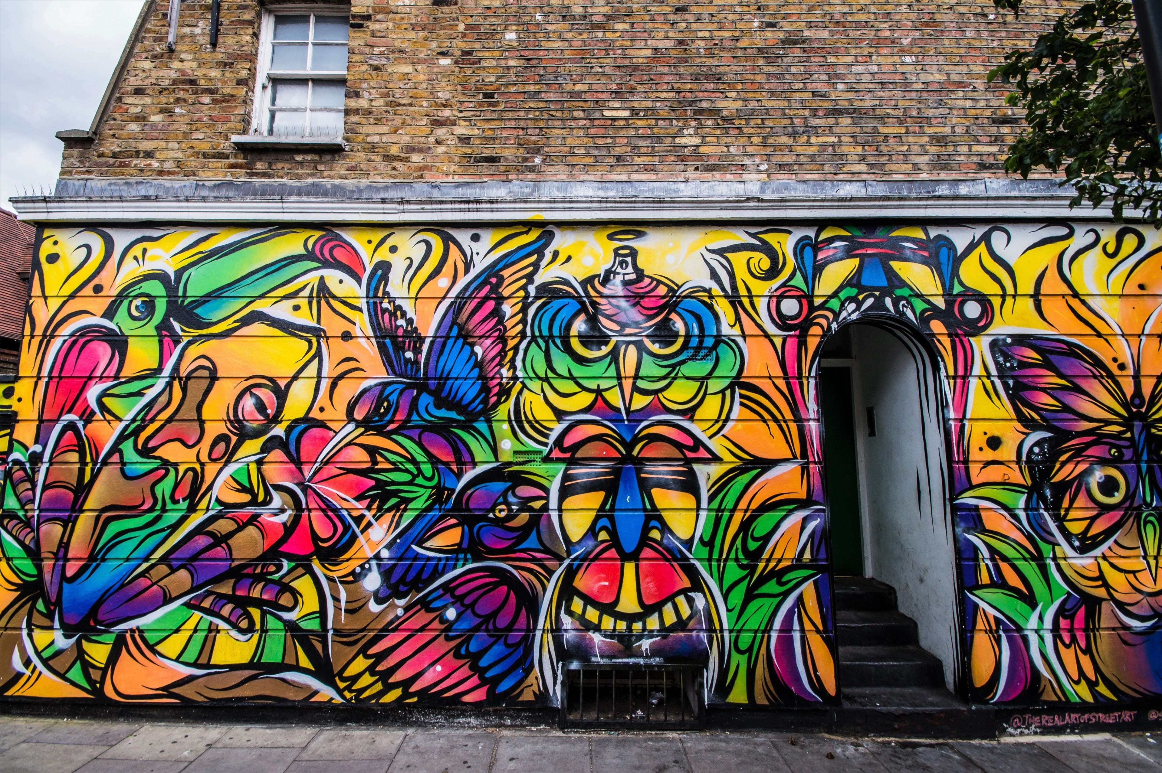 brick wall, human representation, graffiti, wall - building feature, mural, brick, architecture, stained glass, window, 4K, no people, building, multi colored, HD Wallpaper