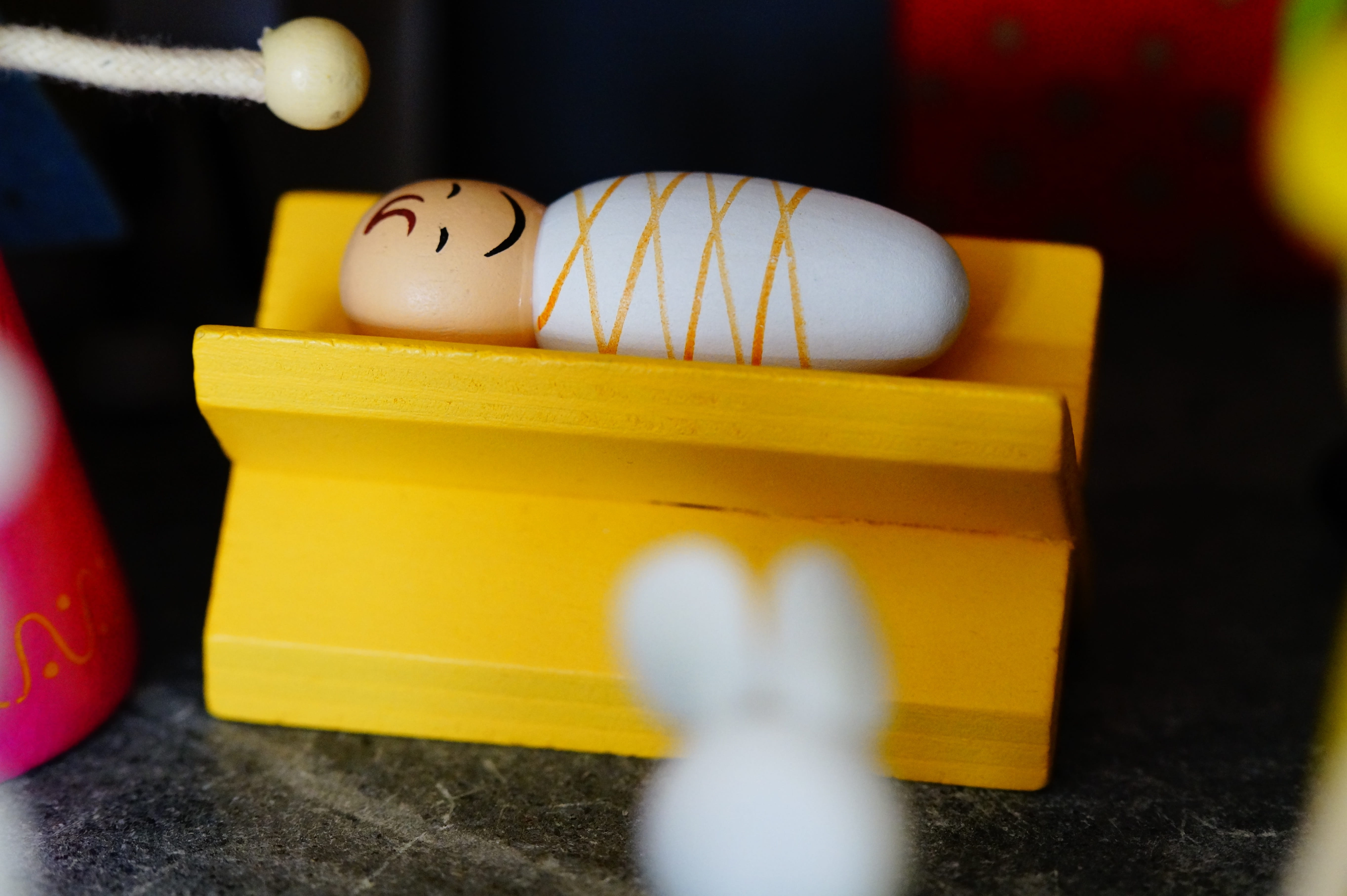 still life, celebration, christmas time, christ, wood - material, yellow, child, religion, easter egg, selective focus, easter, food and drink, crib, christianity, HD Wallpaper