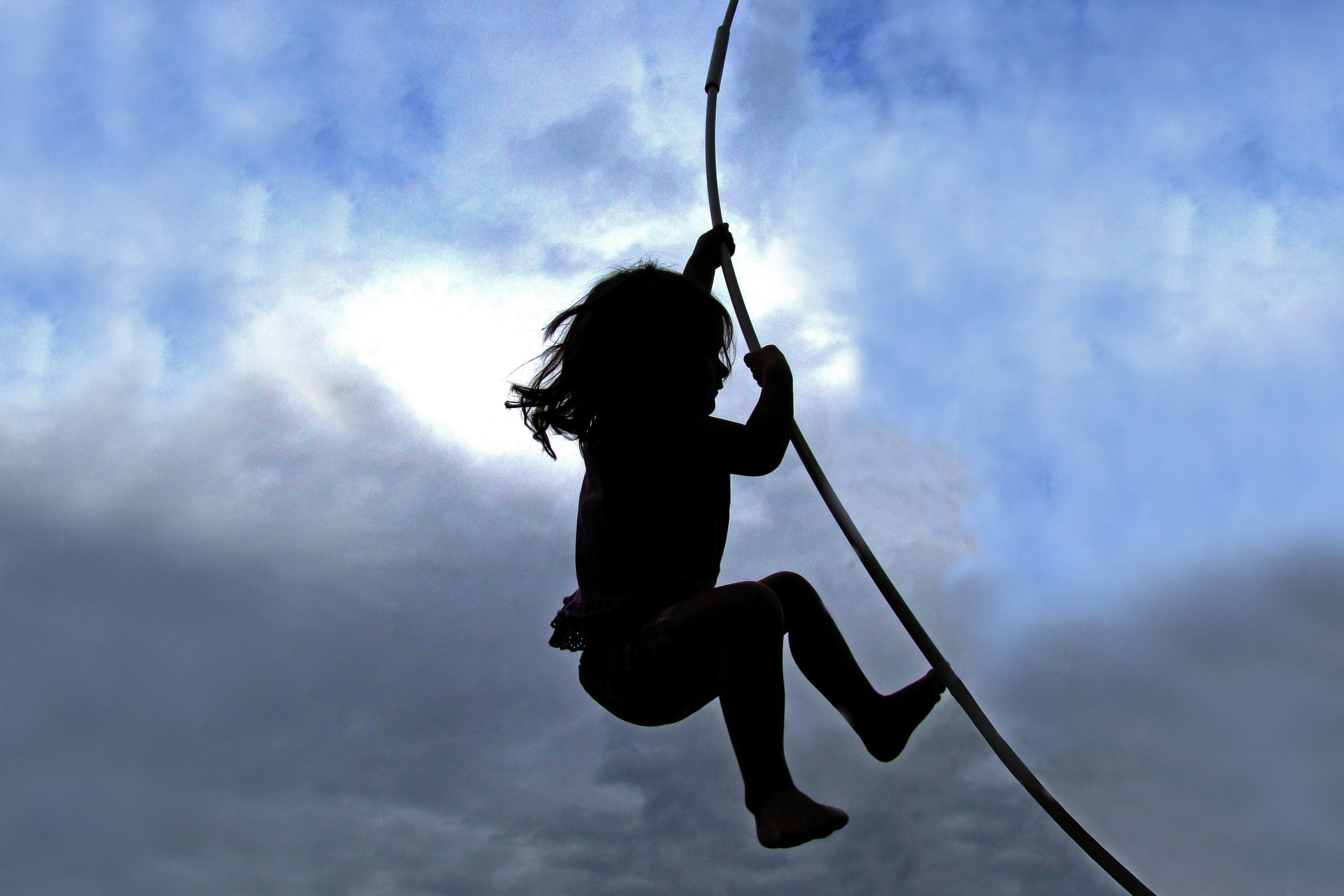 leisure activity, nature, child, trampoline, cloudy, playground, only women, day, adult, 2K, low angle view, one woman only, climbing, childhood, silhouette, HD Wallpaper