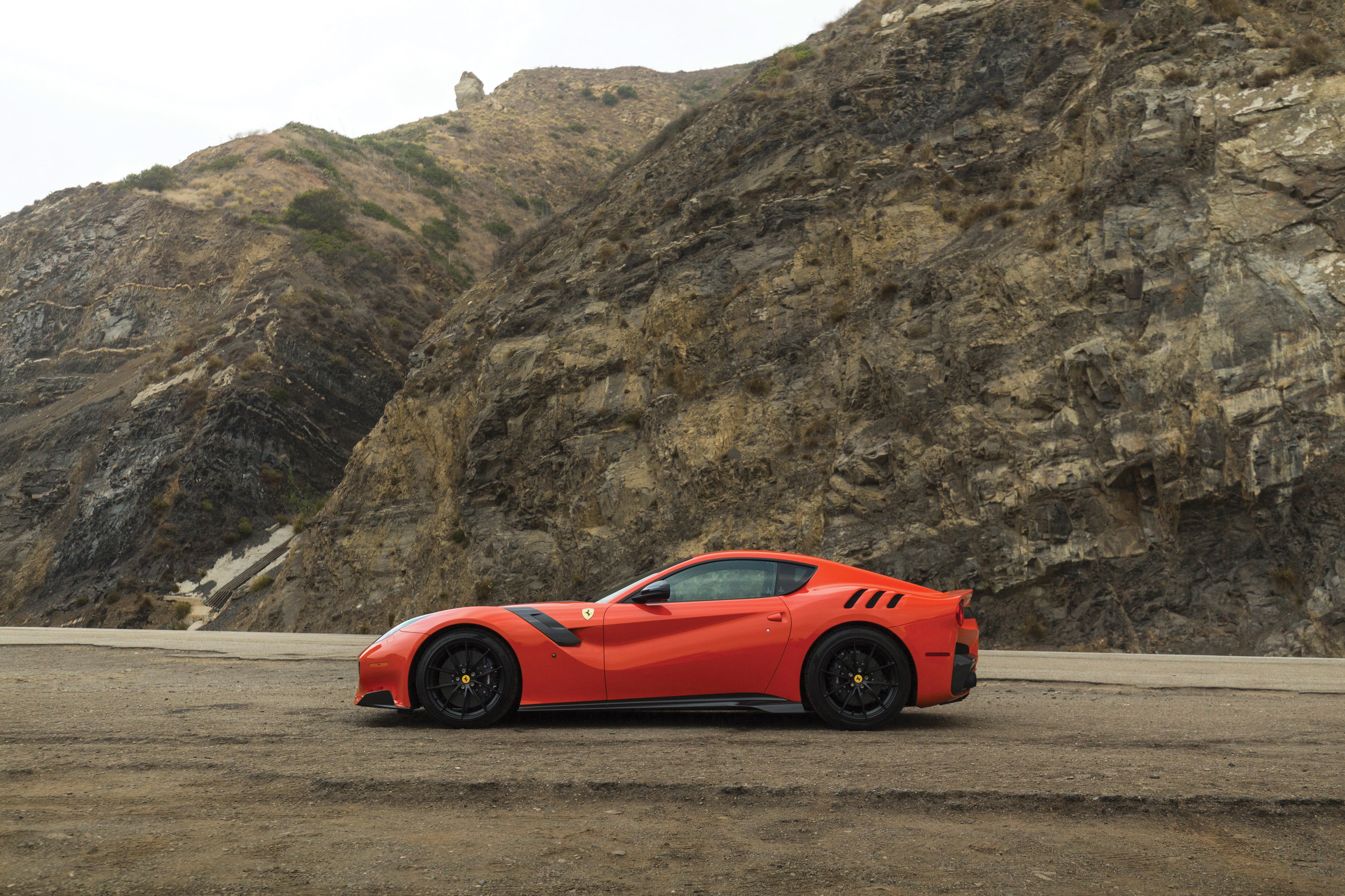 mode of transportation, road, outdoors, ferrari, 4K, land vehicle, solid, rock formation, transportation, mountain, motor vehicle, red, day, rock, nature, HD Wallpaper
