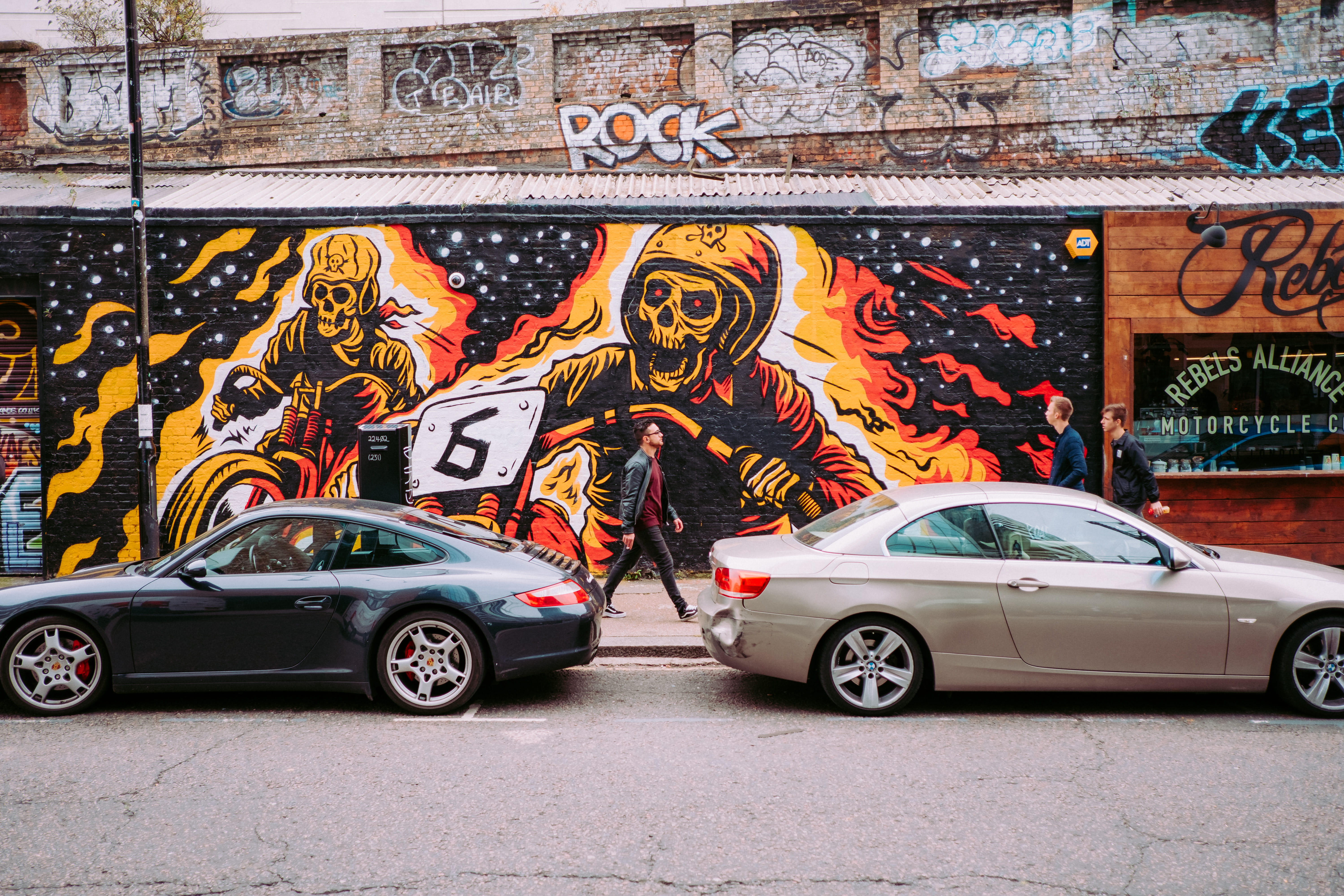day, street art, alloy wheel, land vehicle, transportation, human, wall, alliance, representation, person, spoke, car, rebels, near, automobile, building exterior, HD Wallpaper