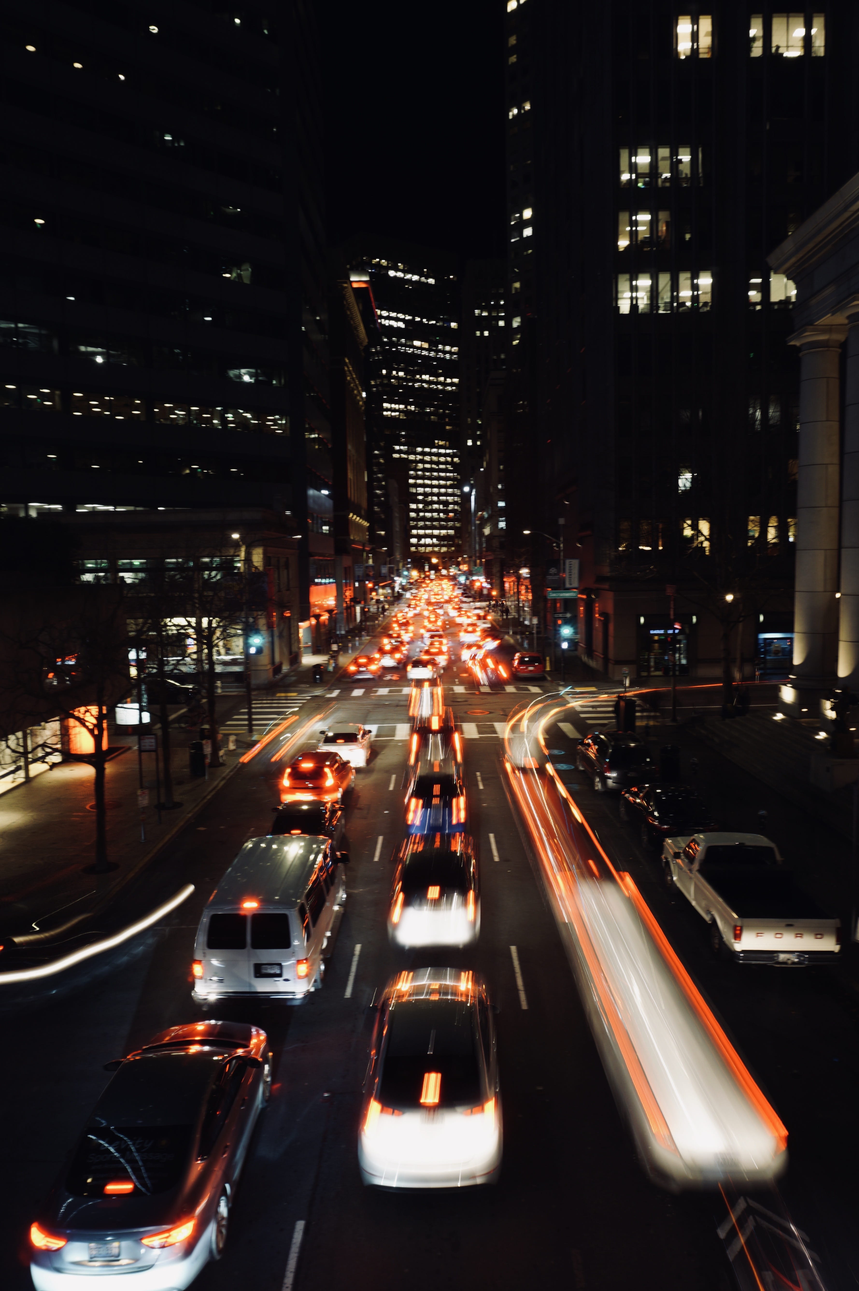 skyscraper, art, headlight, transportation, red, car, highway, concrete, beside, illuminated, vehicles, metropolis, vehicle light, vehicle, light trails, Phone HD Wallpaper