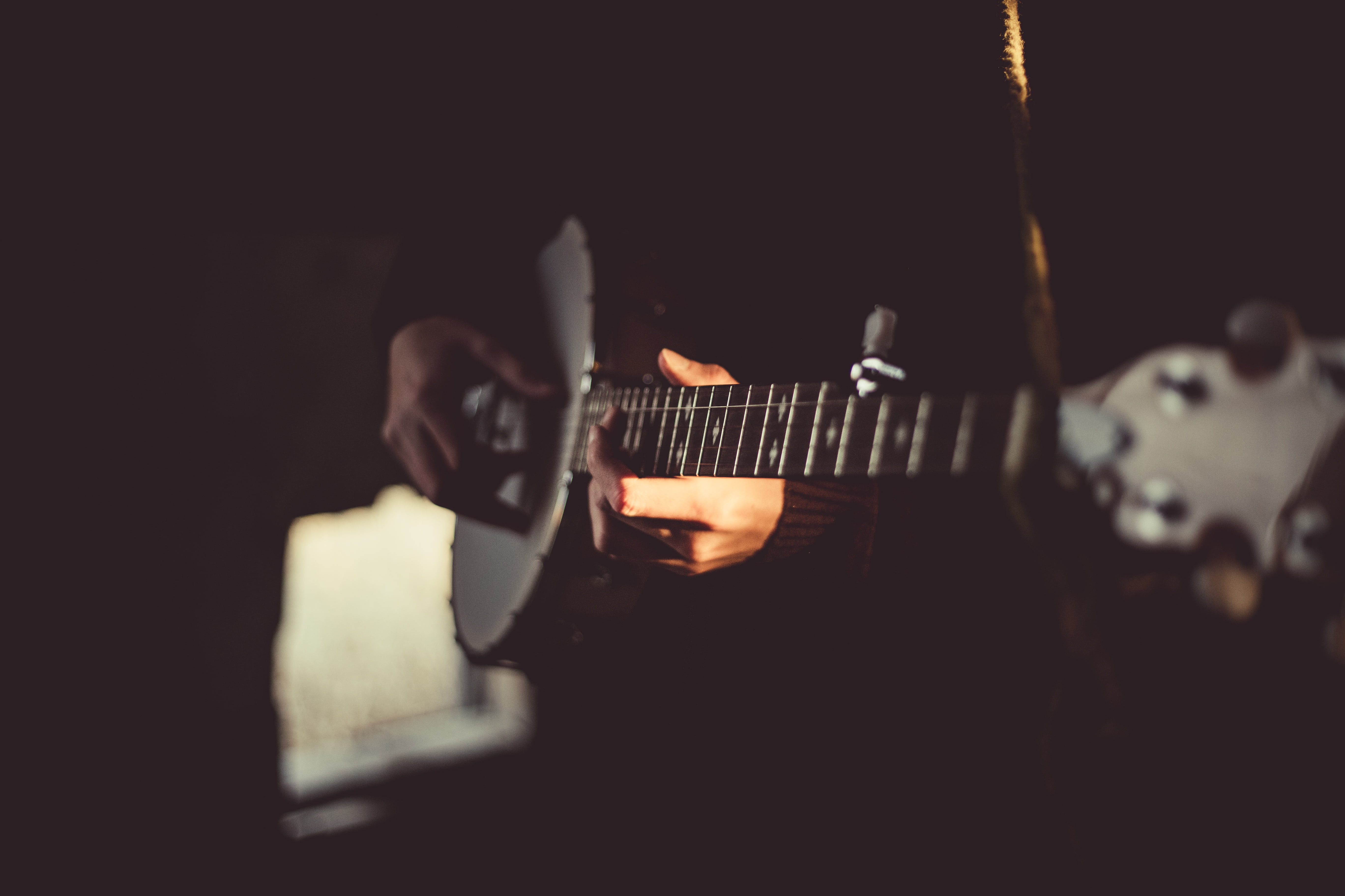 electric guitar, guitar, indoors, rock music, artist, musical instrument, arts culture and entertainment, dark, string instrument, human hand, musical, HD Wallpaper