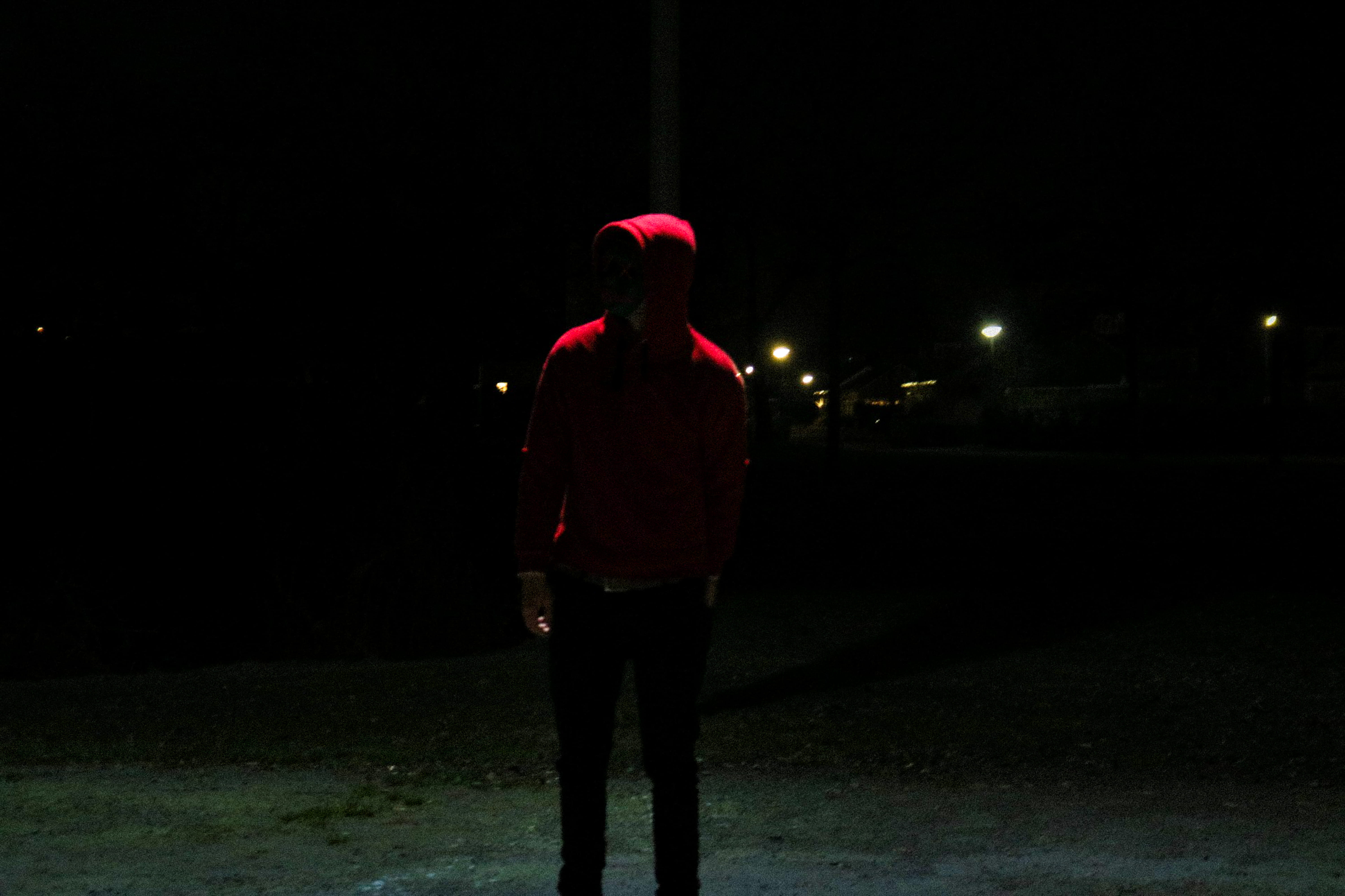 dark, netherlands, illuminated, person, nature, green, photo, walking, 5K, young adult, skull, standing, one person, city, urban, dope, red, casual clothing, HD Wallpaper