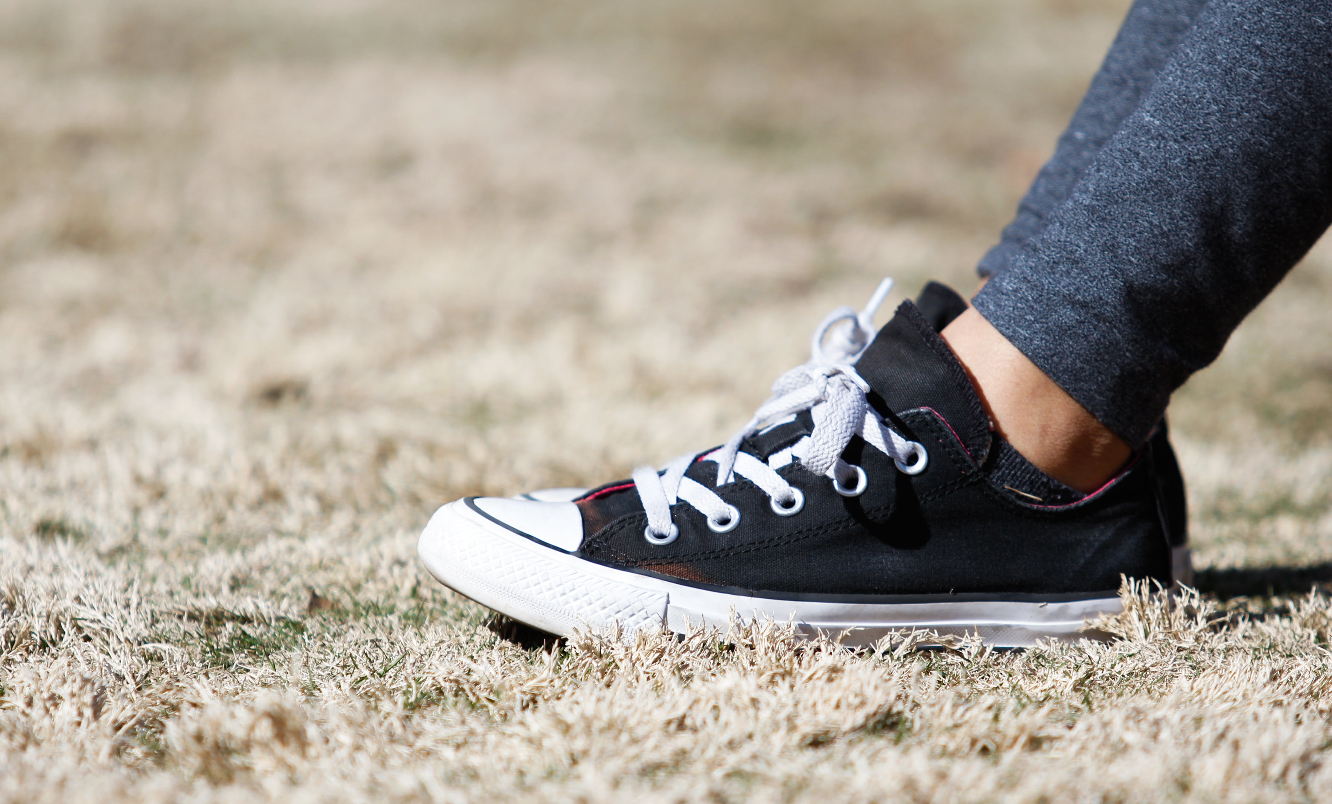 human limb, top, sneakers, adult, close-up, body part, 4K, trendy, footwear, white, legs, focus, human leg, people, black color, young, lifestyles, shoe, HD Wallpaper