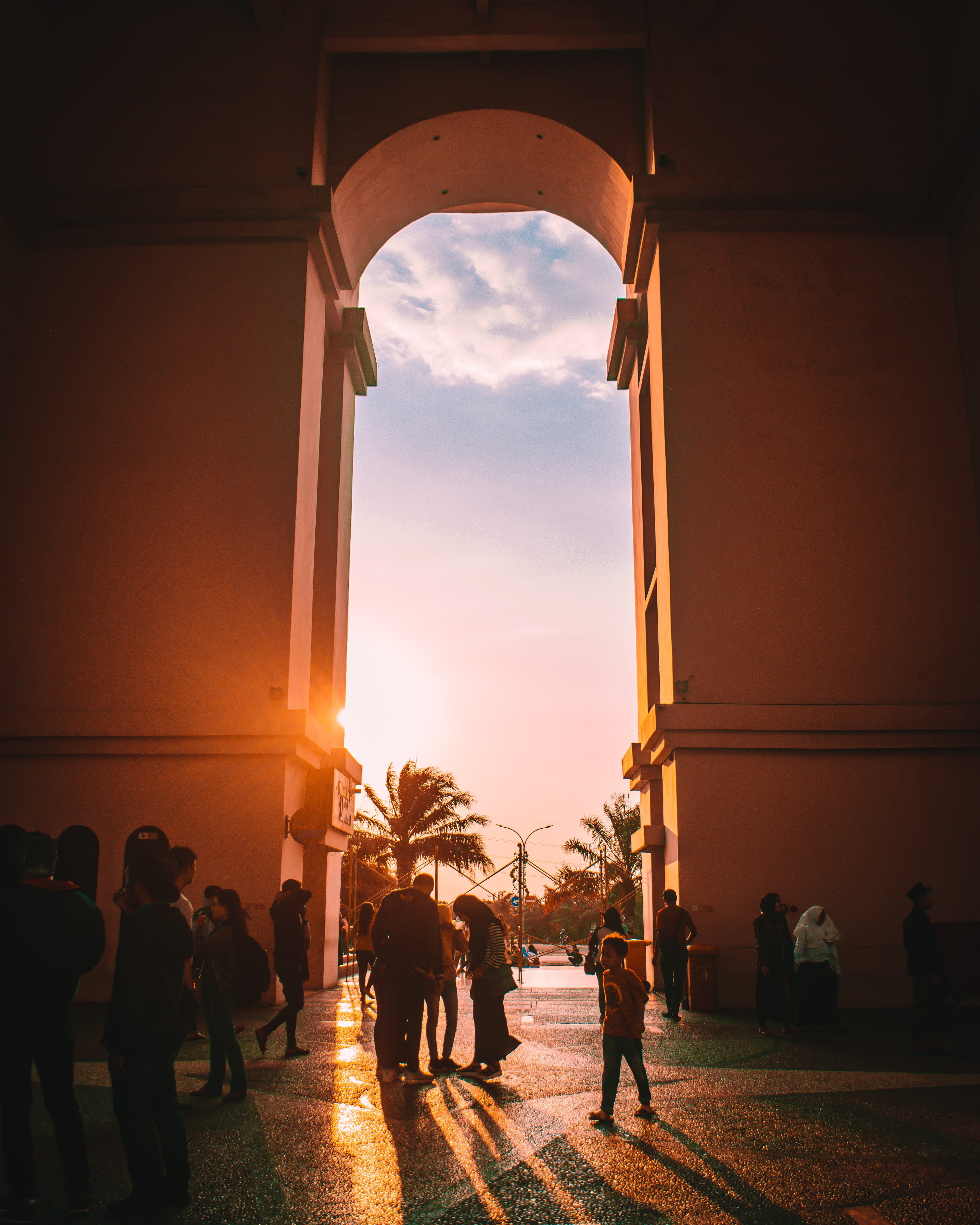 skyline, built structure, building, town, sun, building exterior, large group of people, men, adult, outdoors, construction, indonesia, sunset, sunlight, Phone HD Wallpaper