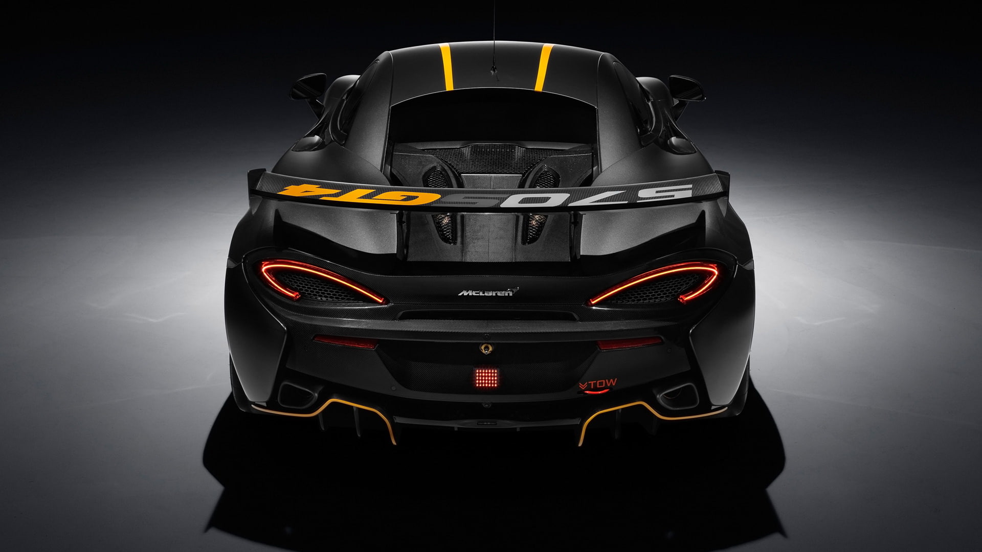 glowing, McLaren 570S, security, single object, protection, technology, sport, McLaren 570S GT4, high angle view, 1080P, safety, dark, gray, studio shot, HD Wallpaper