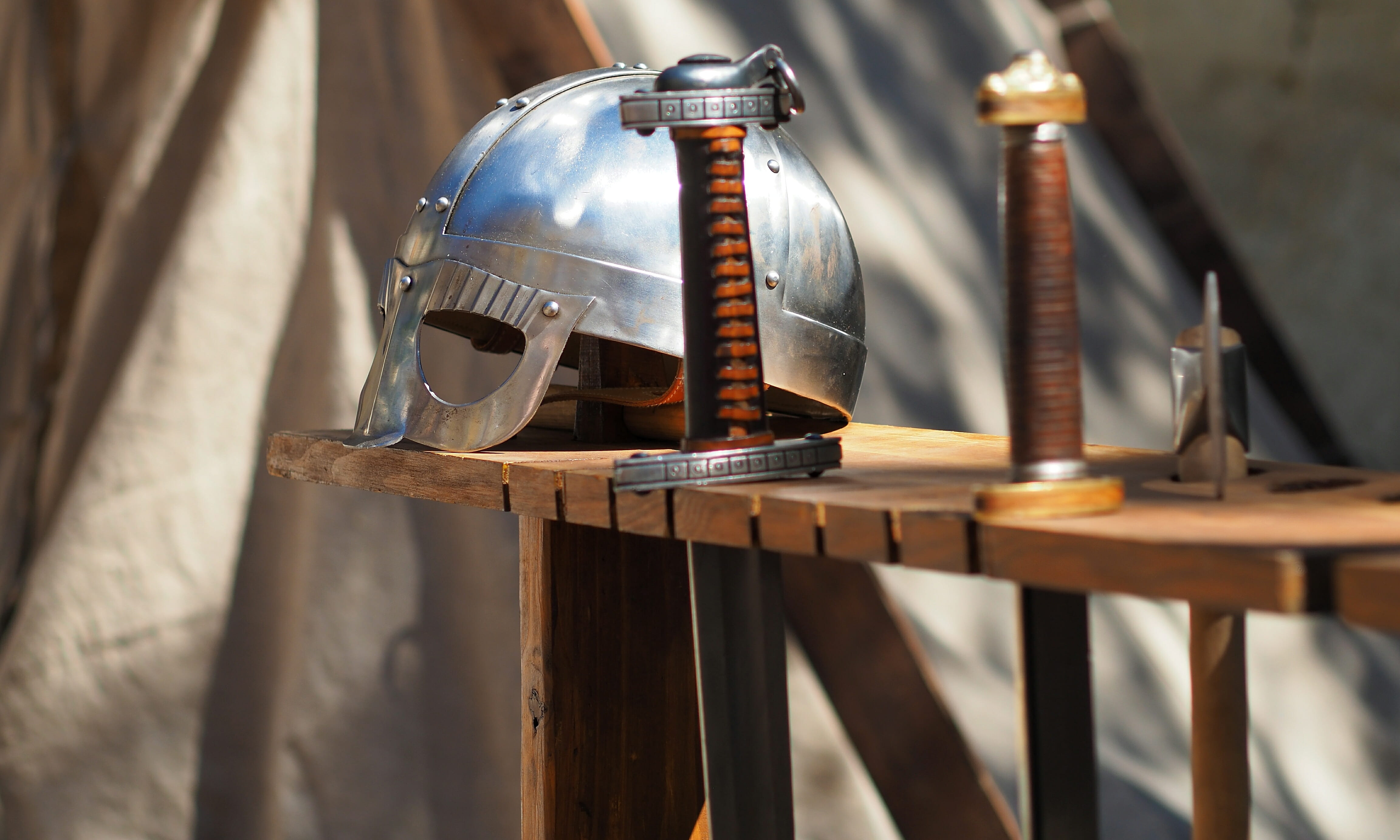focus on foreground, drink, lantern, helmet, sword, no people, wood - material, beside, knight, electric lamp, still life, nature, photography, history, HD Wallpaper