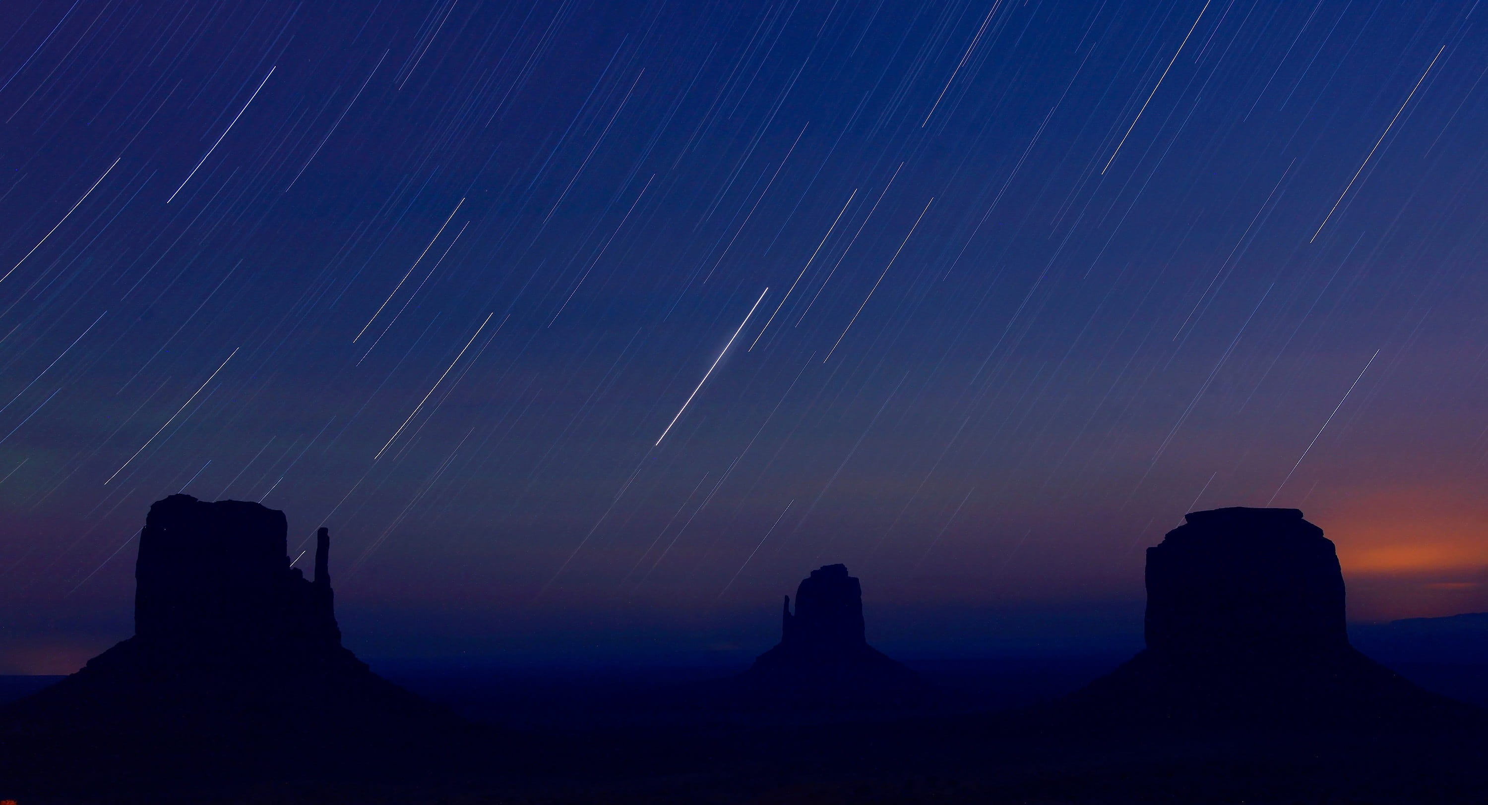 idyllic, desert, no people, star - space, night, sky, landscape, nature, monument valley, blue, startrails, tranquility, environment, 2K, astronomy, silhouette, HD Wallpaper