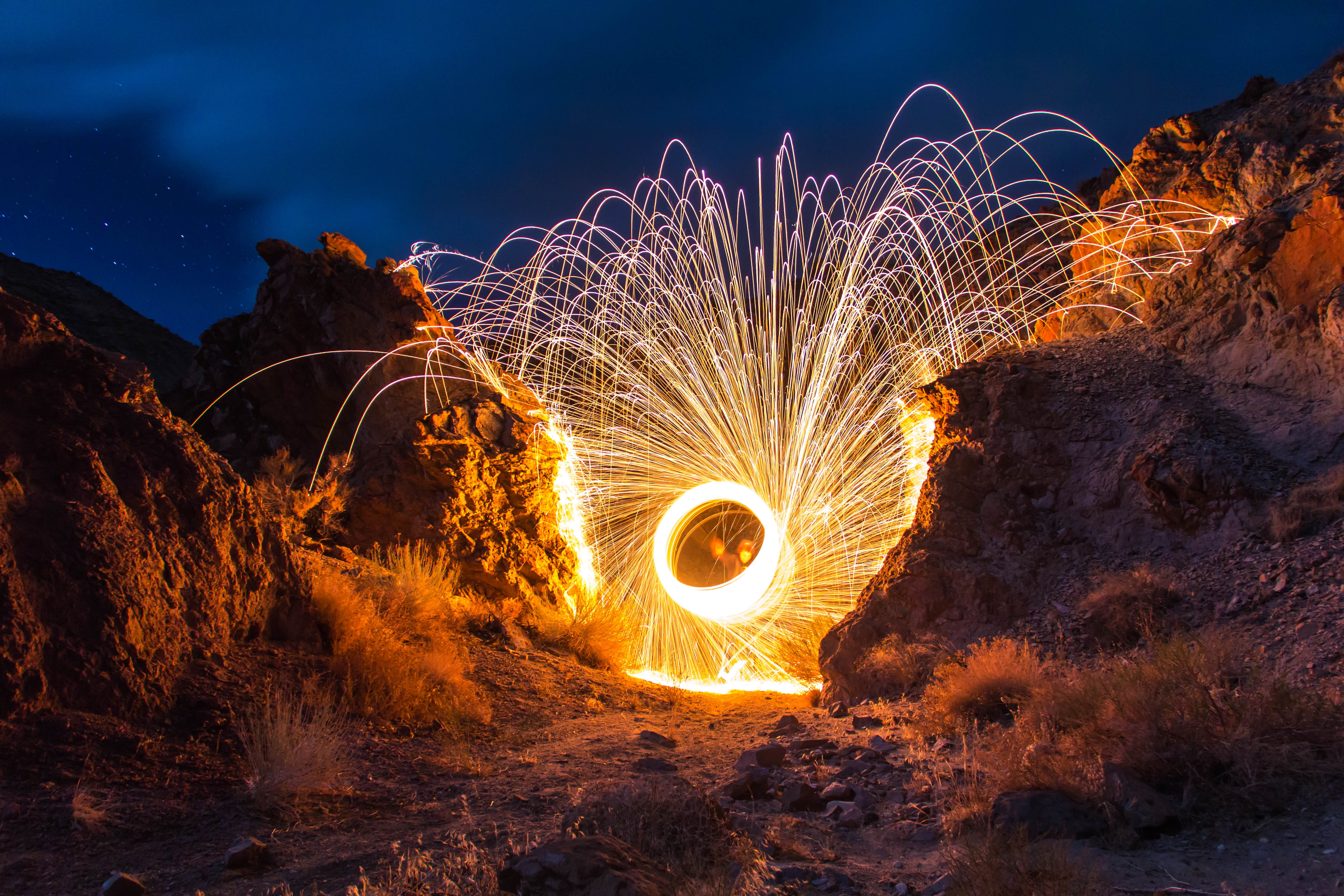 steel, photography, sparks, firework, sky, wire wool, rocks, illuminated, outdoors, nature, evening, communication, mountain, speed, fire - natural phenomenon, HD Wallpaper