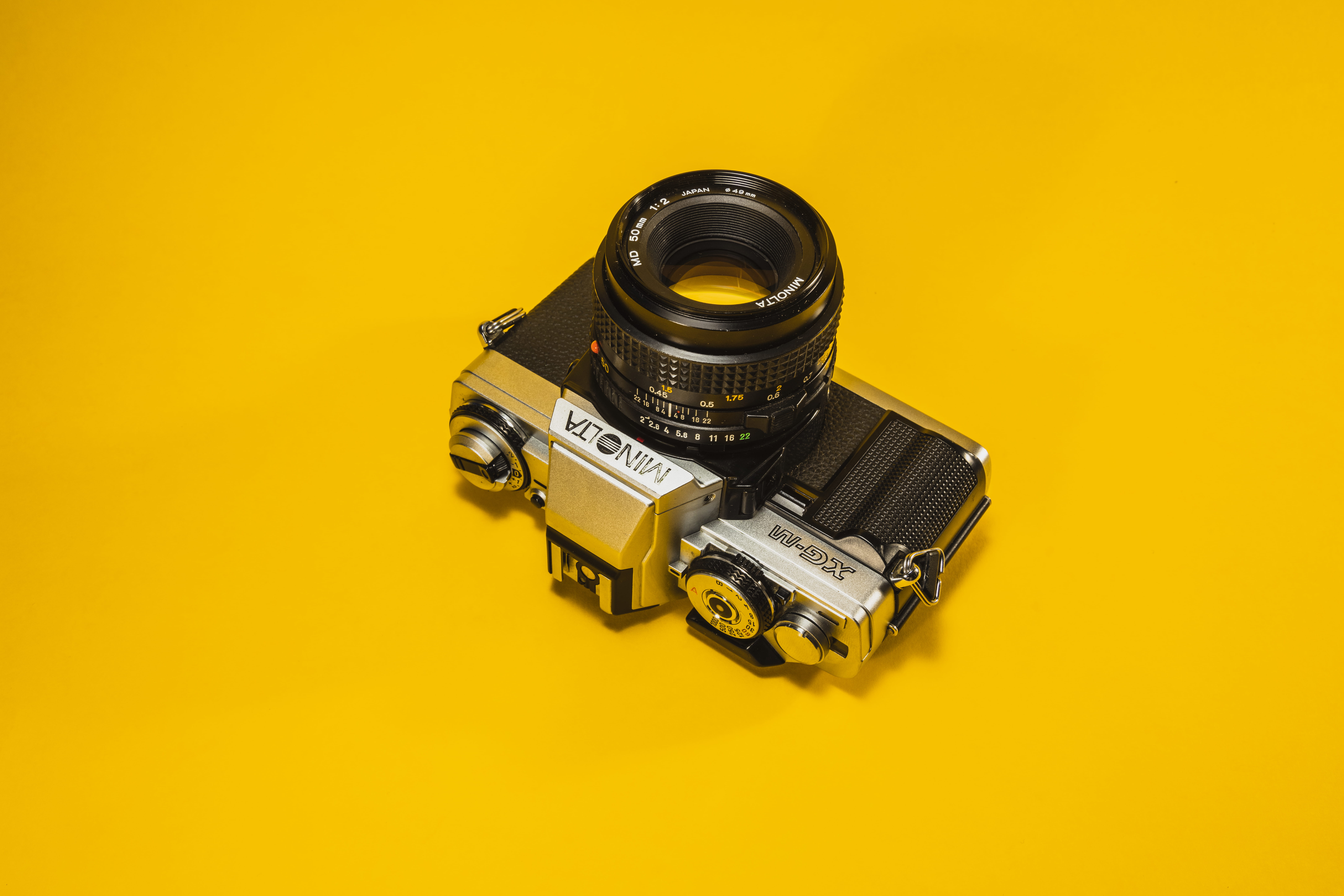 dust, yellow background, colors, cut out, no people, electronics, gray, konica, camera - photographic equipment, indoors, still life, industry, alloy wheel, HD Wallpaper