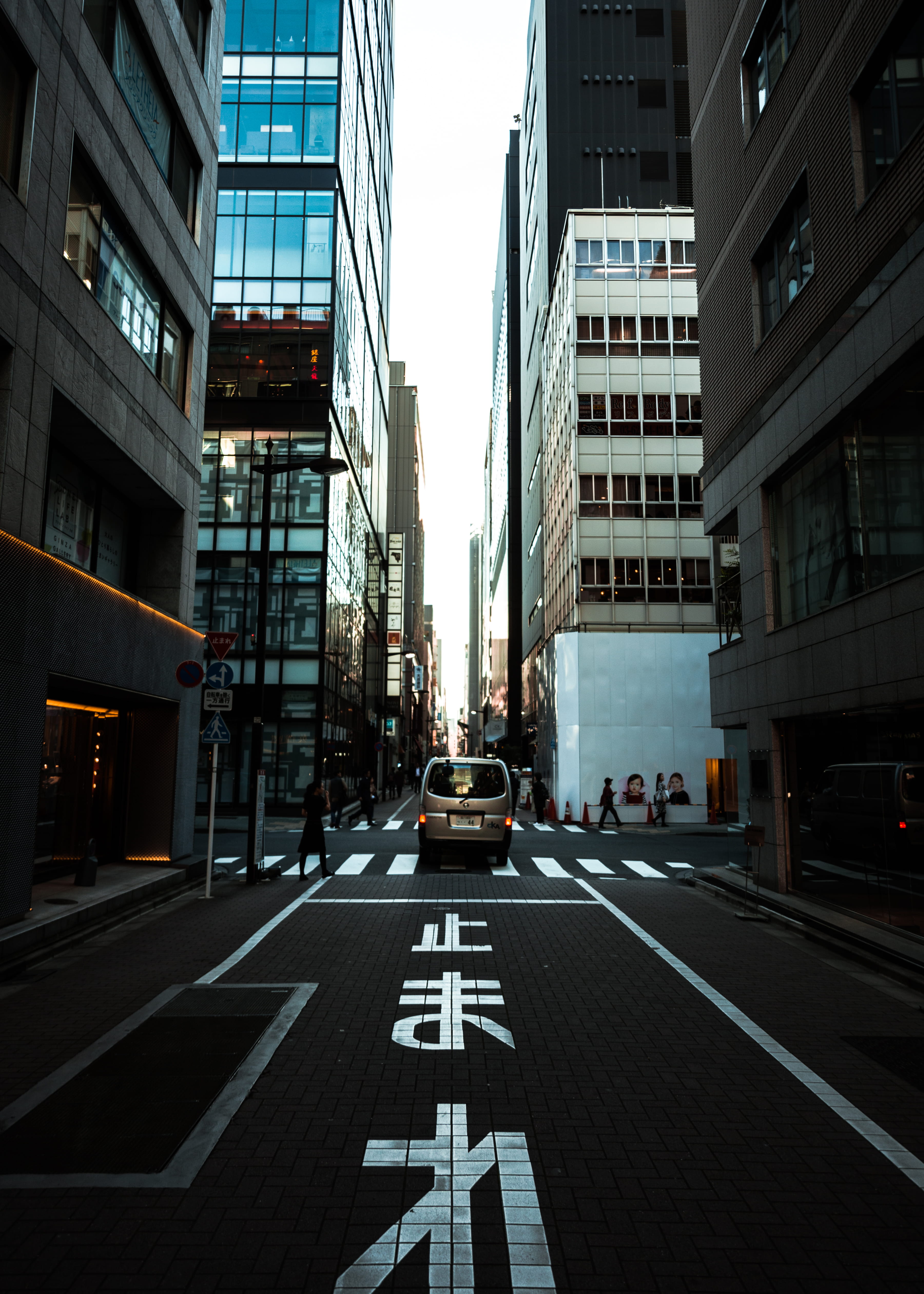 office building exterior, car, sign, street, mode of transportation, marking, road, road marking, nature, 4K, urban, person, wide, incidental people, building, Phone HD Wallpaper