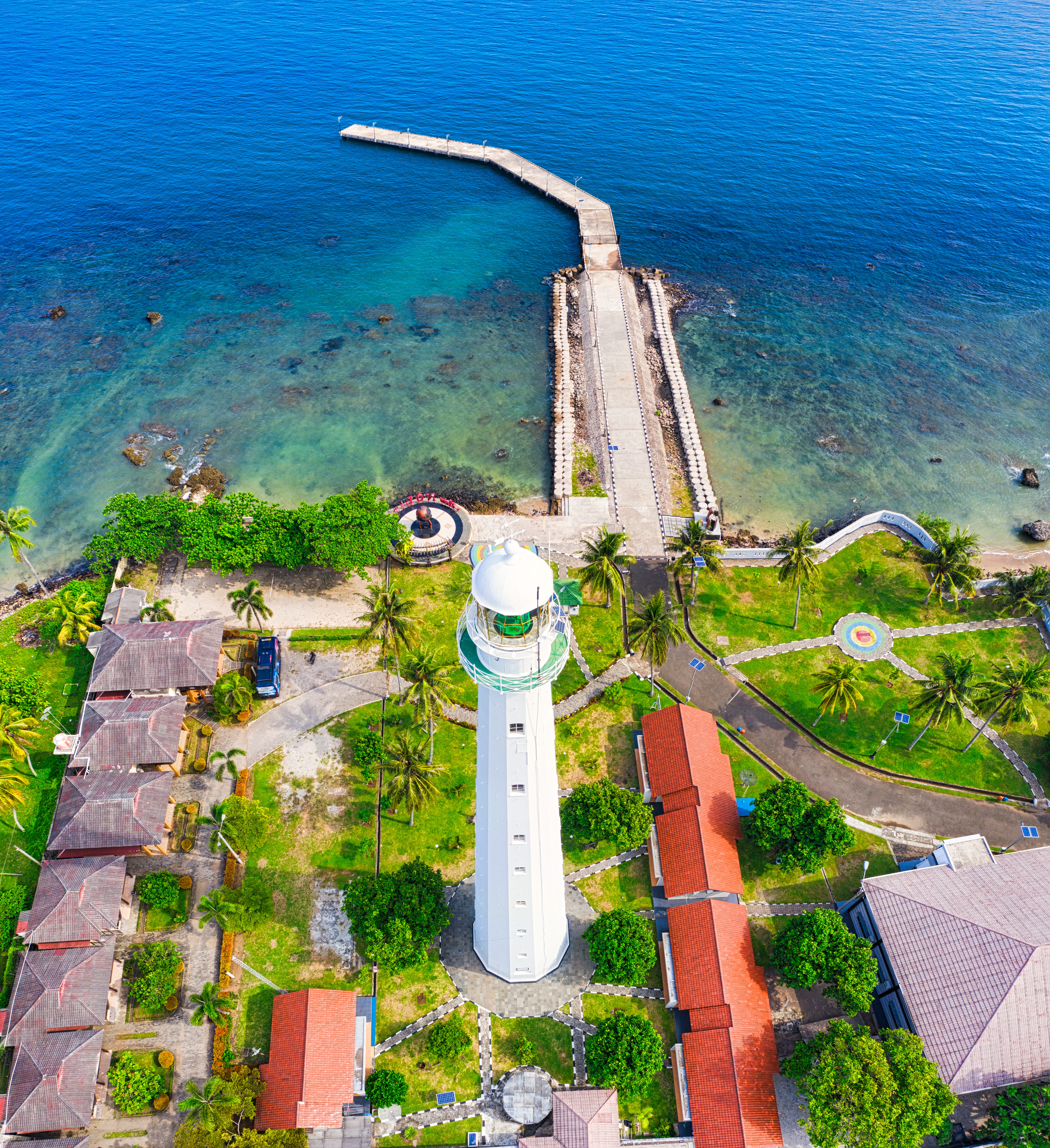 drone footage, coastline, beauty in nature, seascape, shoreline, lighthouse, scenics - nature, landscape, sea, resort, urban, sight, grass, seashore, architecture, Phone HD Wallpaper