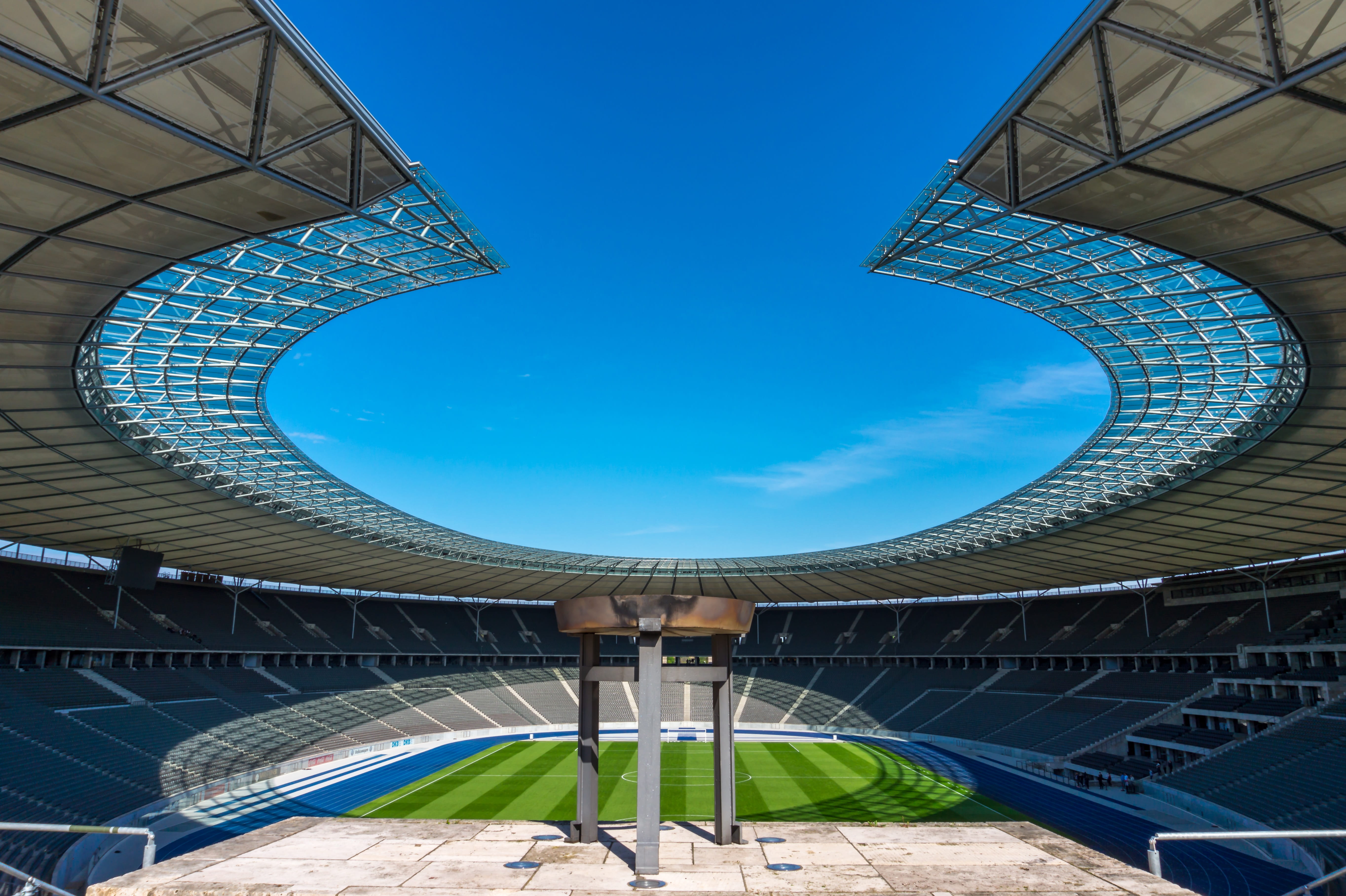 olympic fire, low angle view, outdoors, soccer, cloud - sky, building exterior, no people, sunlight, history, day, blue, grandstand, stadium, city, travel destinations, HD Wallpaper