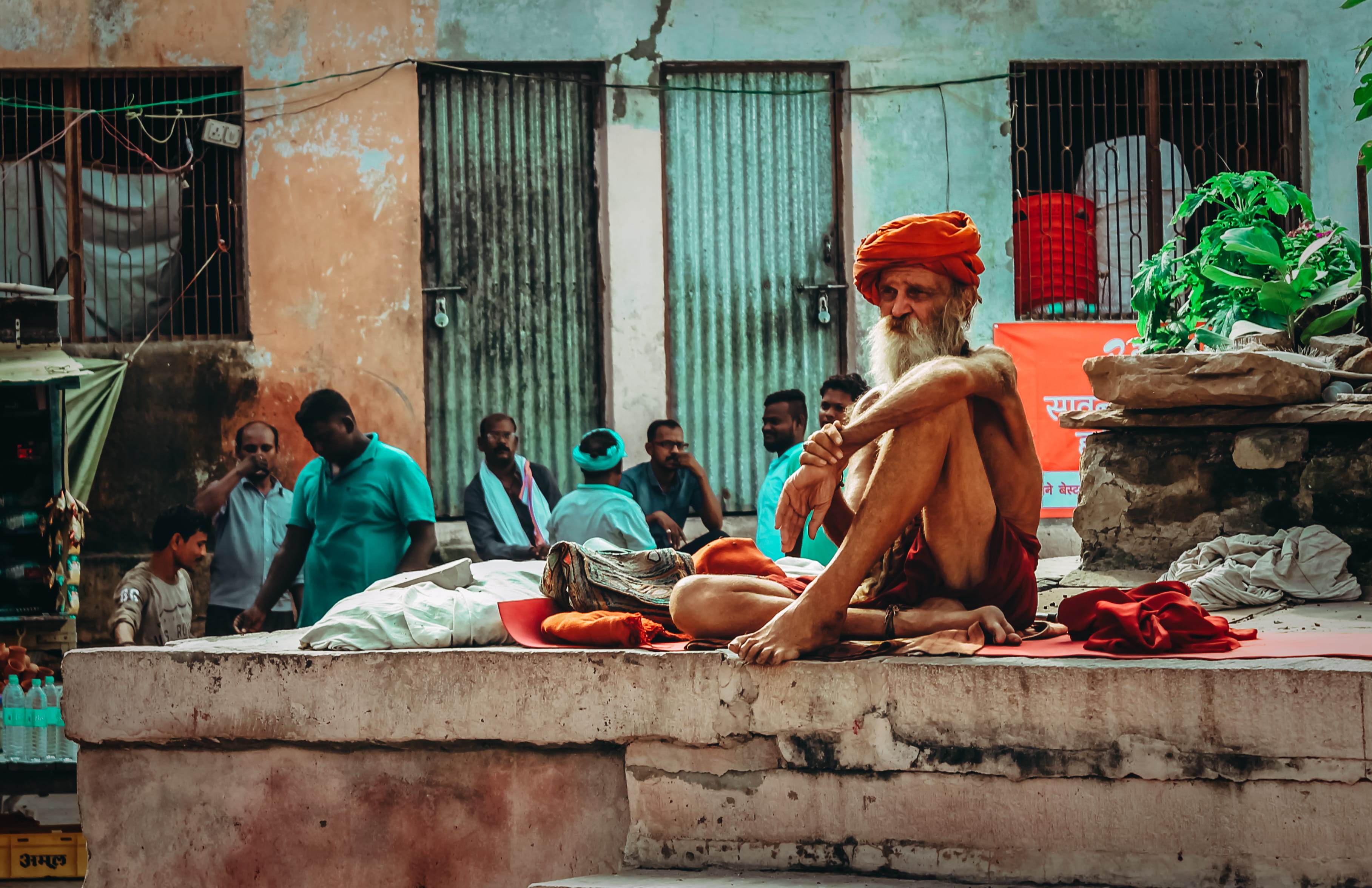 people, hindu, sitting, relaxation, stage, turban, spirituality, building exterior, women, real people, beard, human, 2K, sadhu, face, city, man, lifestyles, HD Wallpaper