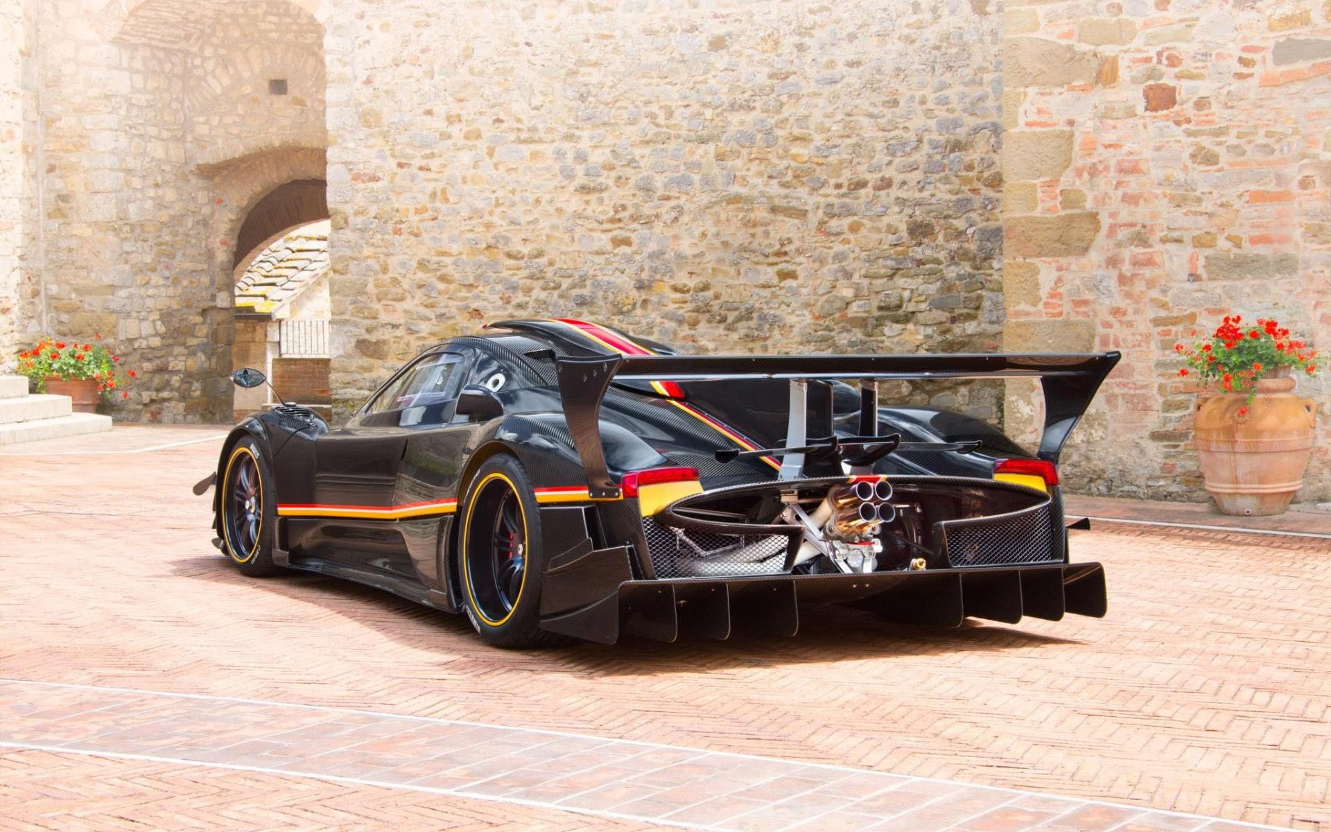 Pagani Zonda Revolucion, built structure, 1080P, wall - building feature, car, brick, outdoors, mode of transportation, transportation, motion, wall, Pagani, HD Wallpaper