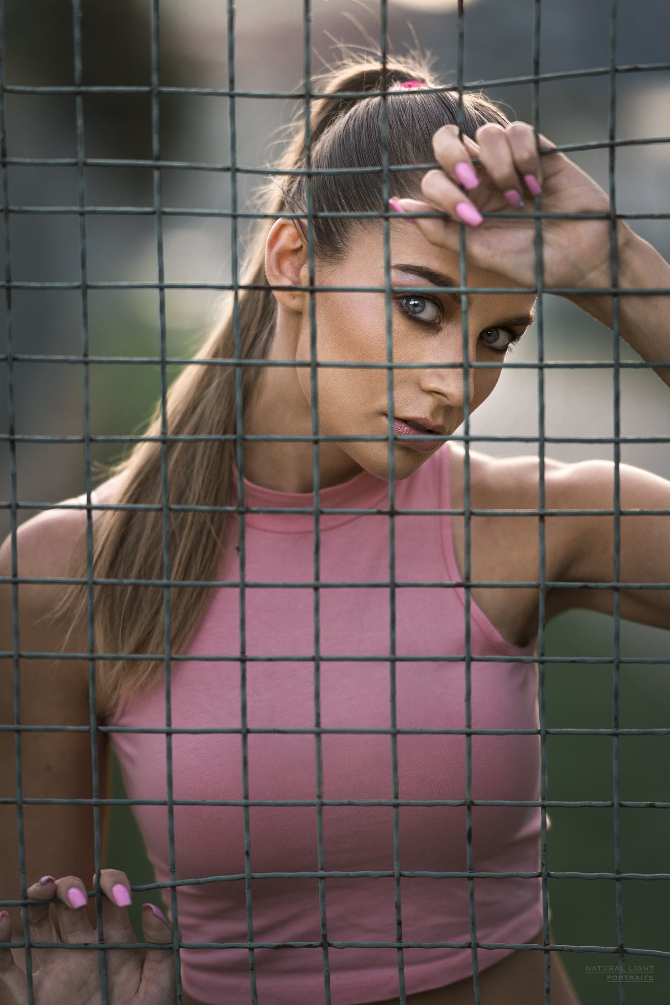 portrait, young adult, 500px, pink nails, teenager, contemplation, brown hair, fence, hair, wire mesh, depth of field, serious, front view, young women, Phone HD Wallpaper