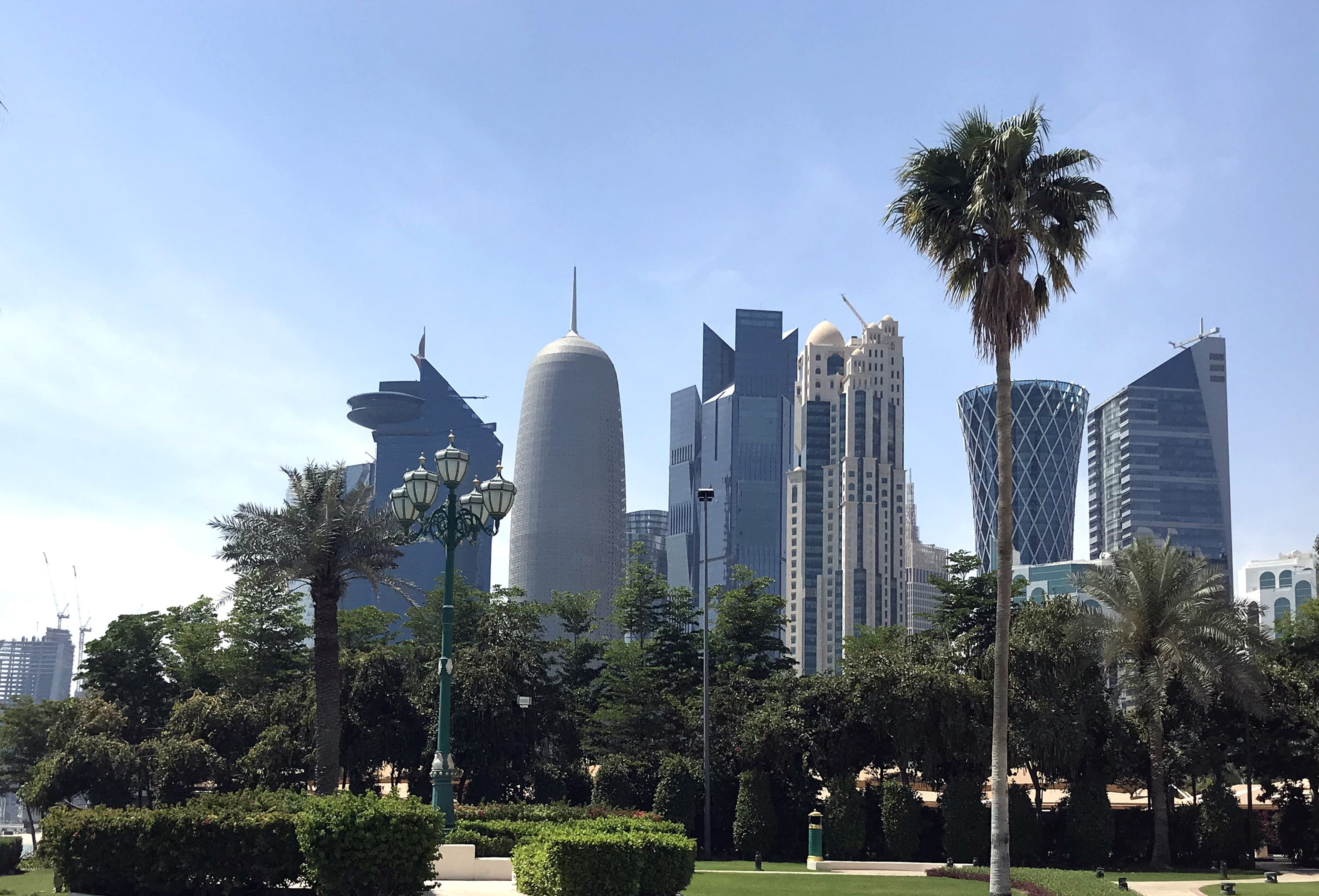 cityscape, tall - high, tower, sky, spire, palm tree, tropical climate, no people, doha, tourism, travel destinations, built structure, day, middle, middle east, HD Wallpaper