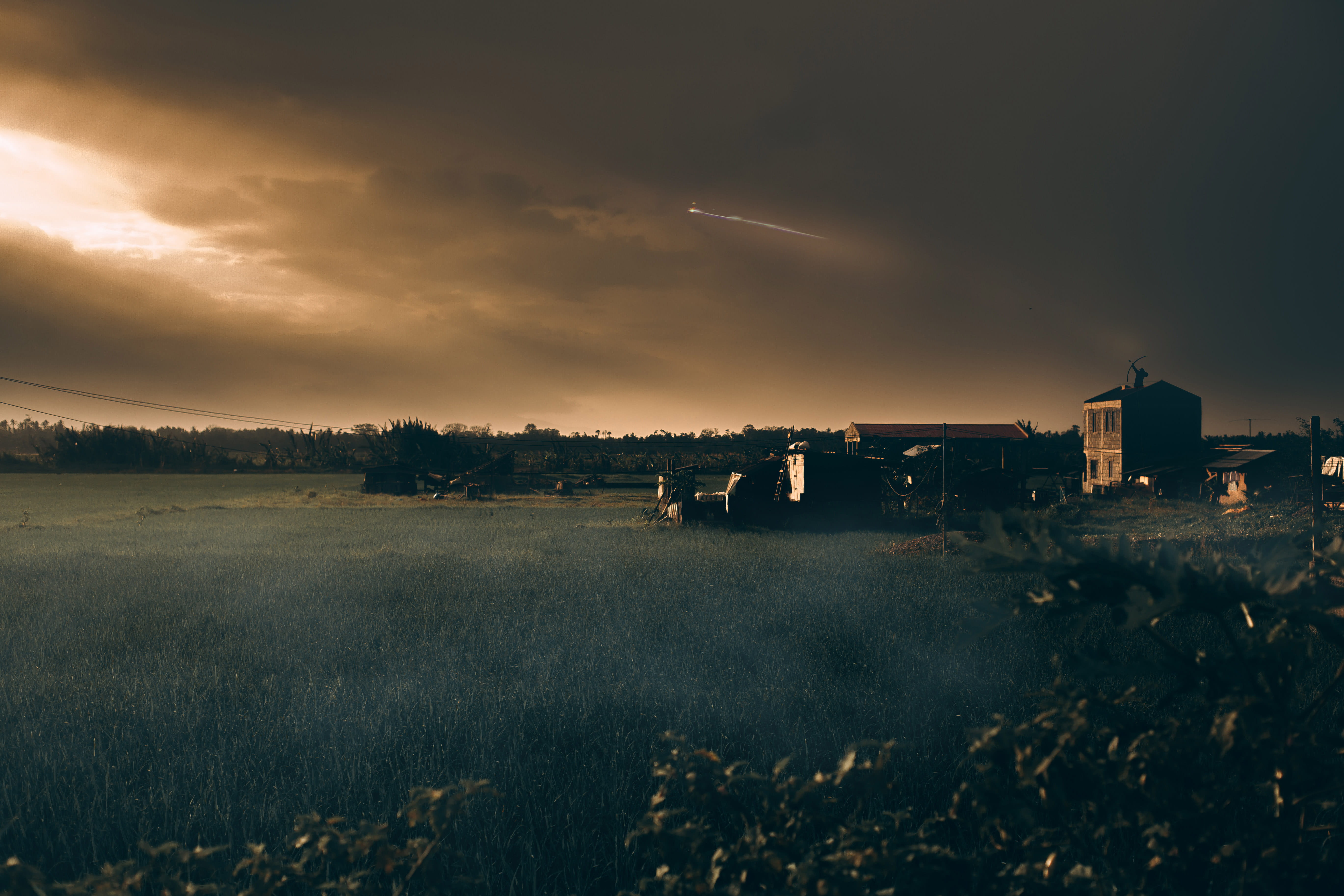 dark, beauty in nature, bow, sunset, banana, archer, nature, trees, farm, land, residential district, tranquility, barn, fire, grass, outdoors, built structure, HD Wallpaper