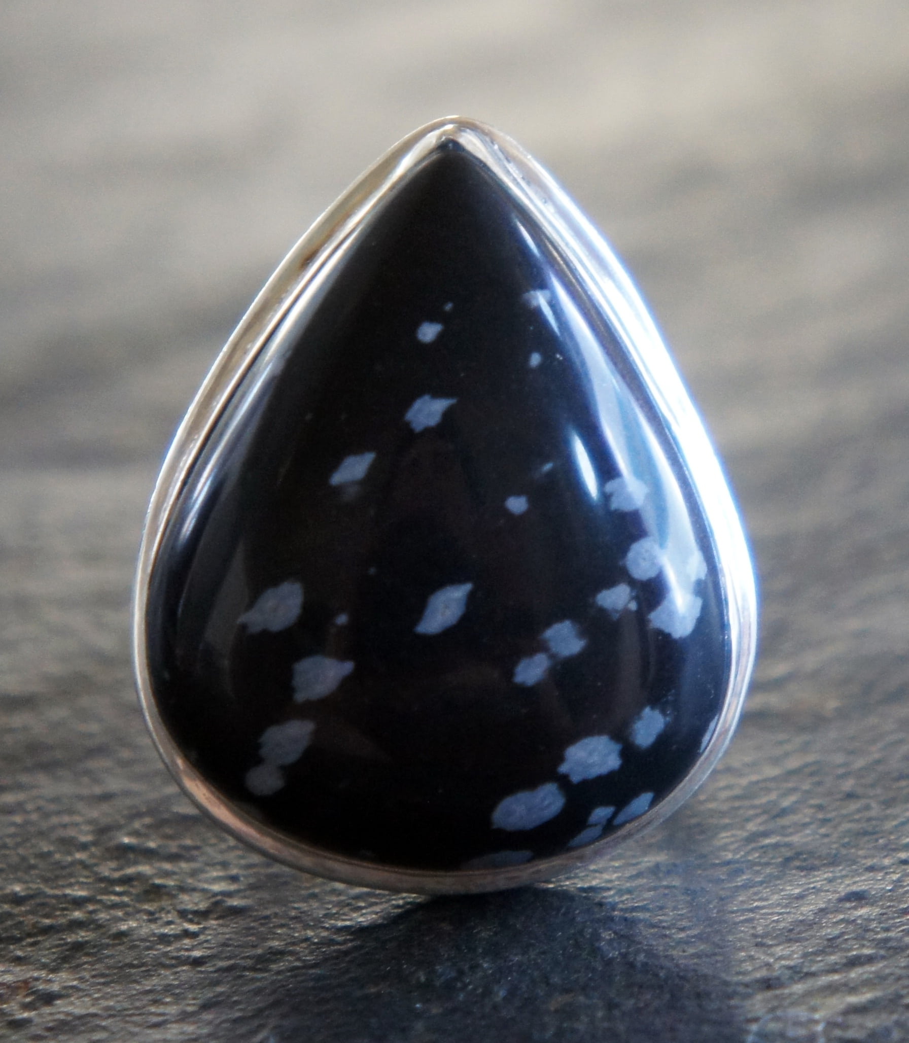focus on foreground, cabochon, silver, still life, wood - material, white, single object, cab, glass - material, ball, no people, close-up, stone, teardrop, Phone HD Wallpaper