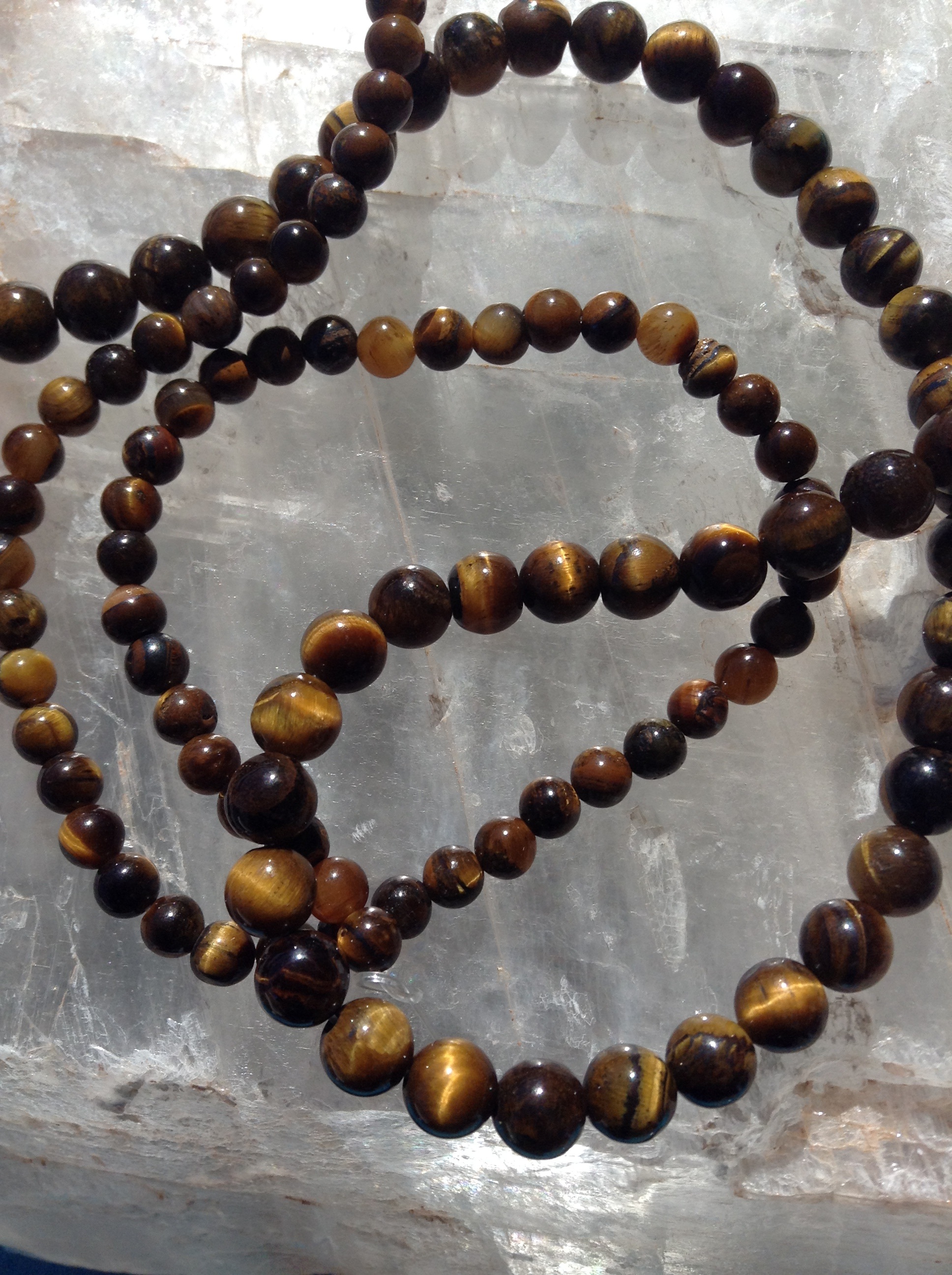 semiprecious, stones, art and craft, tigers eye beads, high angle view, food and drink, focus on foreground, food, gemstone, arrangement, semi-precious, Phone HD Wallpaper