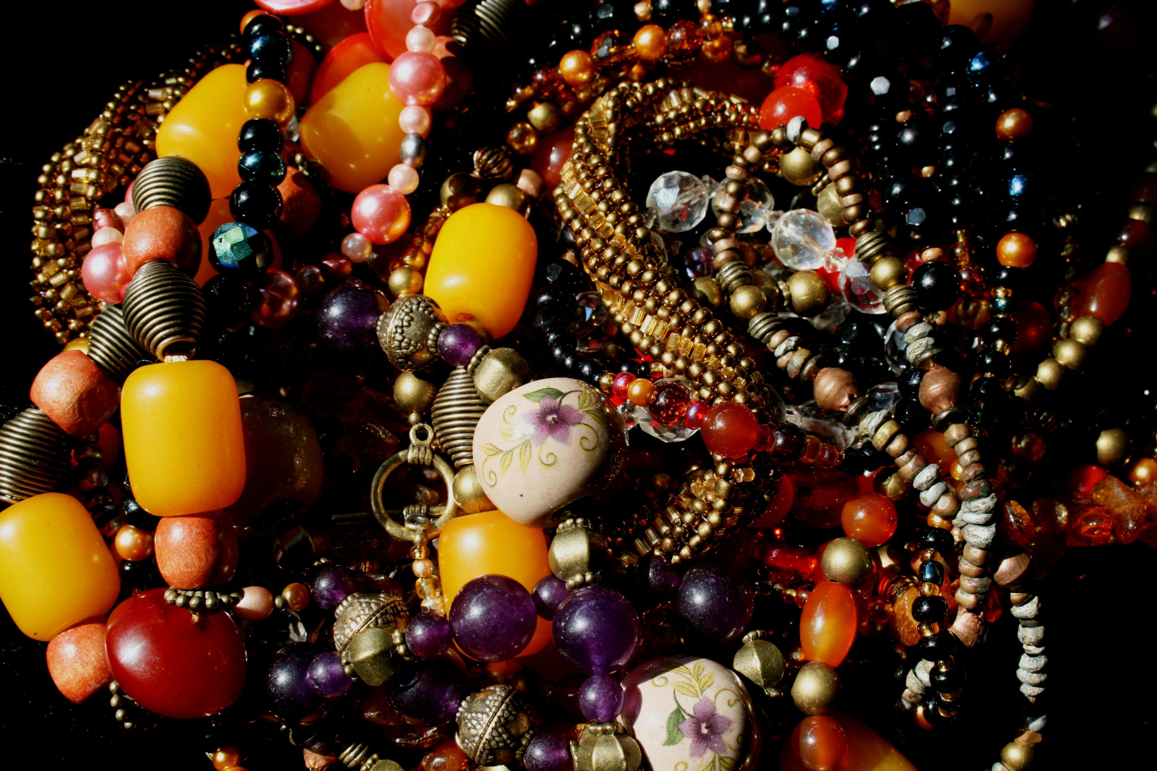 ceramics, metalic beads, pearl jewelry, jewellery, gold, backgrounds, bead necklaces, 4K, bead, still life, indoors, multi colored, yellow, lot, close-up, HD Wallpaper