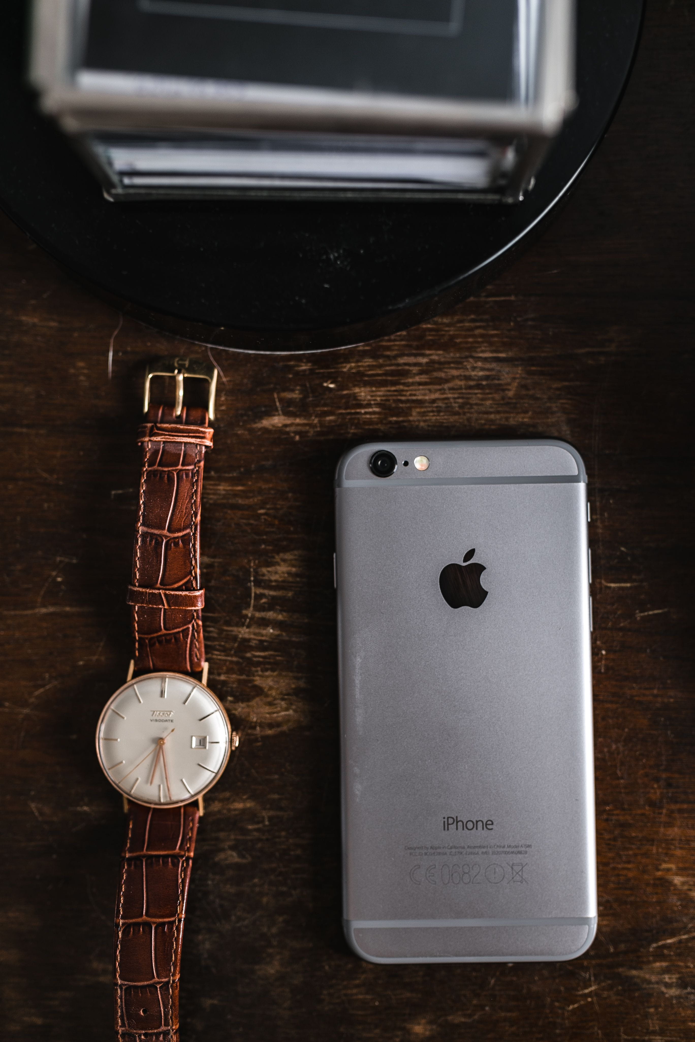 indoors, arts culture and entertainment, apple, leather, essentials, communication, watch, close-up, manly, brown, directly above, telephone, 4K, no people, Phone HD Wallpaper