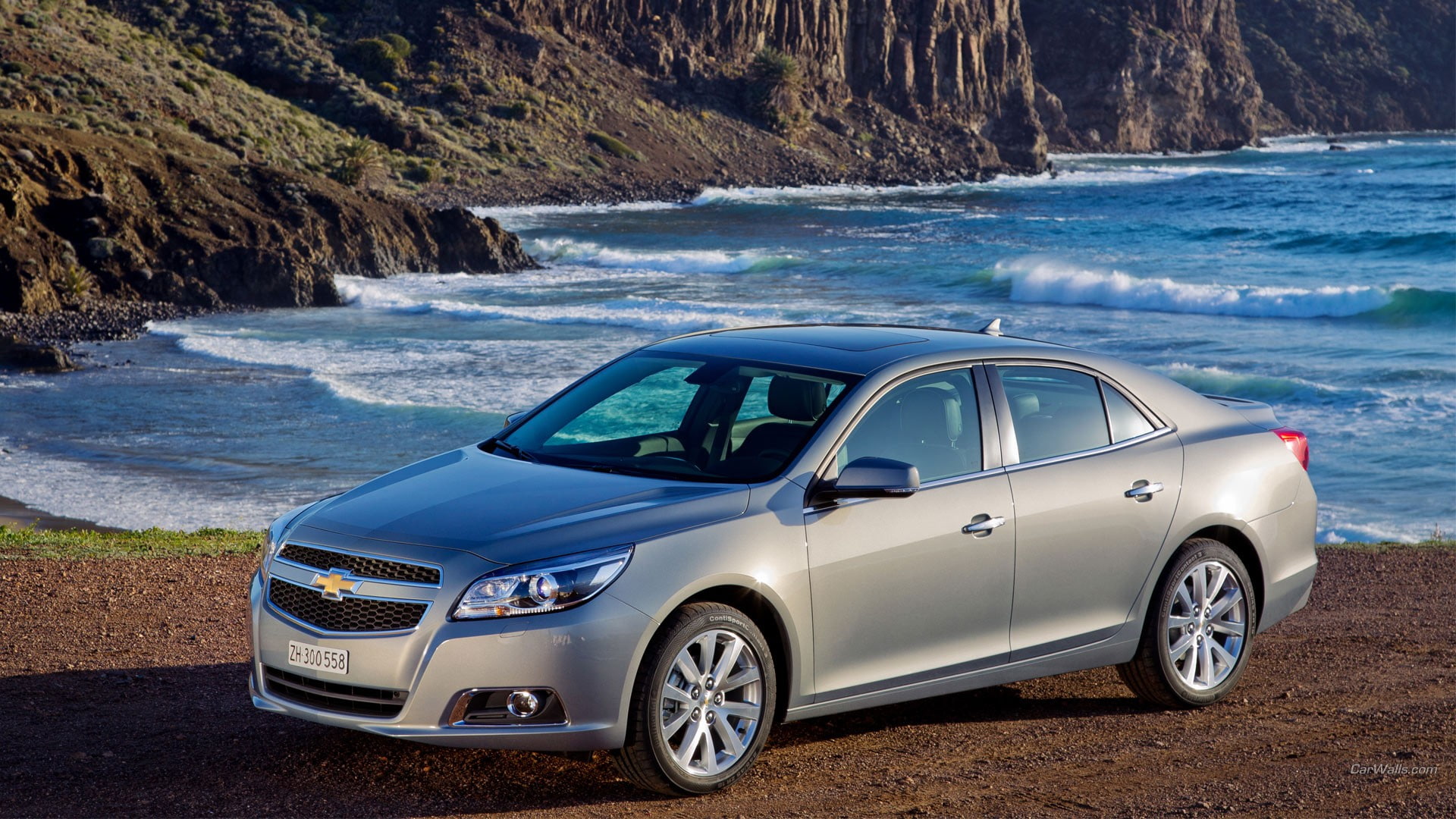 water, beauty in nature, sea, surfing, 1080P, motion, rock, aquatic sport, land vehicle, wave, car, mode of transportation, transportation, Chevrolet Malibu, HD Wallpaper