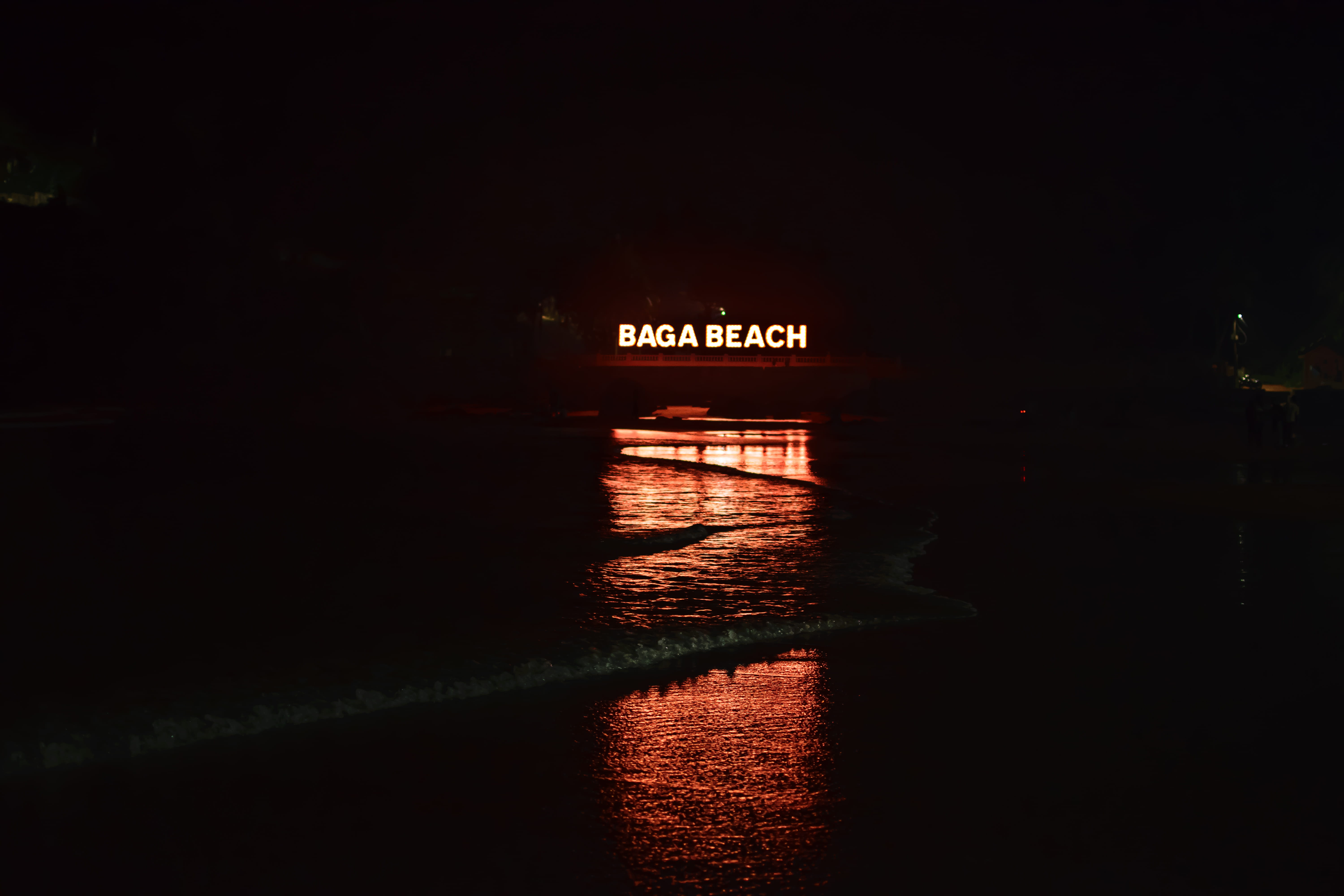 illuminated, dark, architecture, baga beach, light - natural phenomenon, river, text, nature, 5K, india, western script, neon, sea, water, night, built structure, HD Wallpaper
