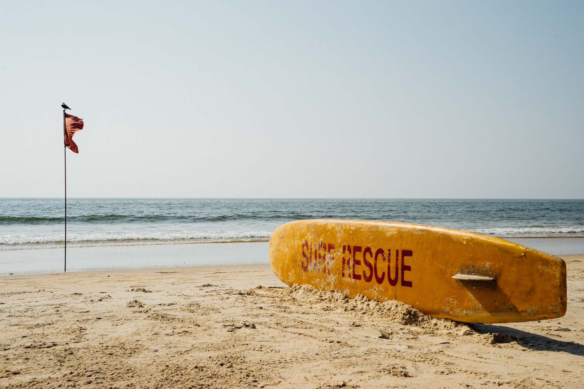 safety, coastline, clear sky, goa, text, exotic, pole, relaxation, flag, coast, surfboard, horizon over water, nature, communication, land, travel, sand, HD Wallpaper