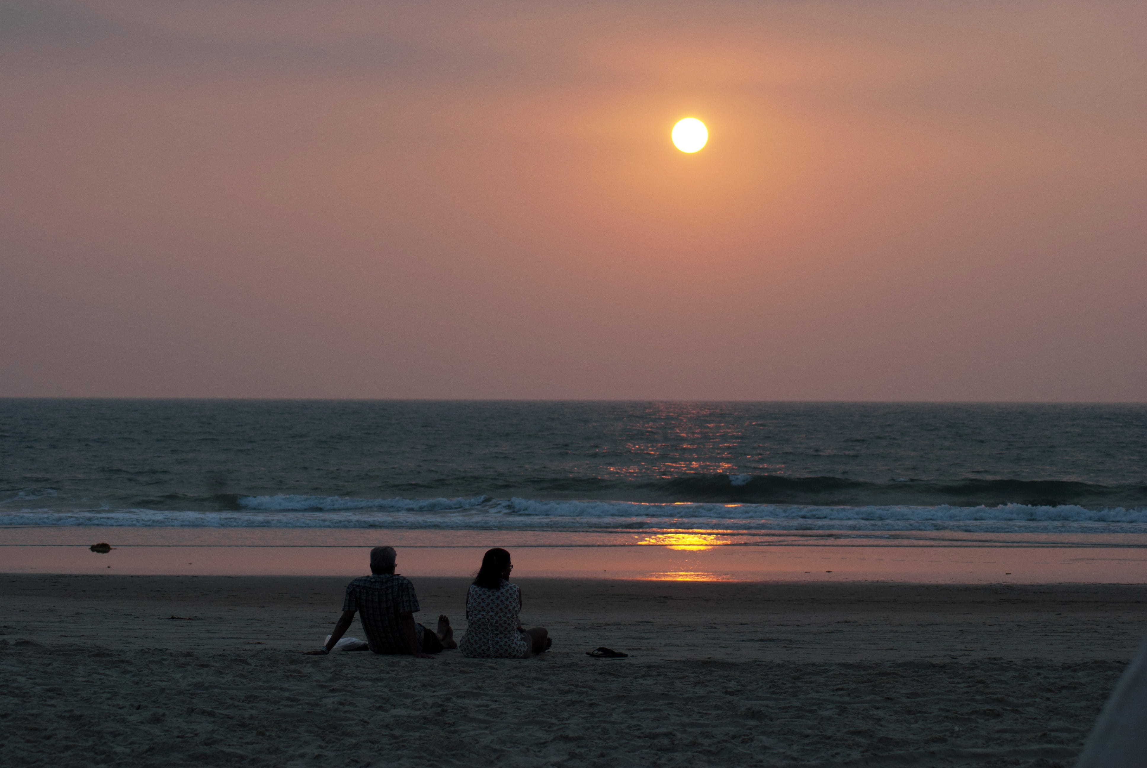 water, Couple, real people, sand, beauty in nature, silhouette, togetherness, Goa, near, men, valentine, leisure activity, horizon, sea, Beach, Sunset, HD Wallpaper