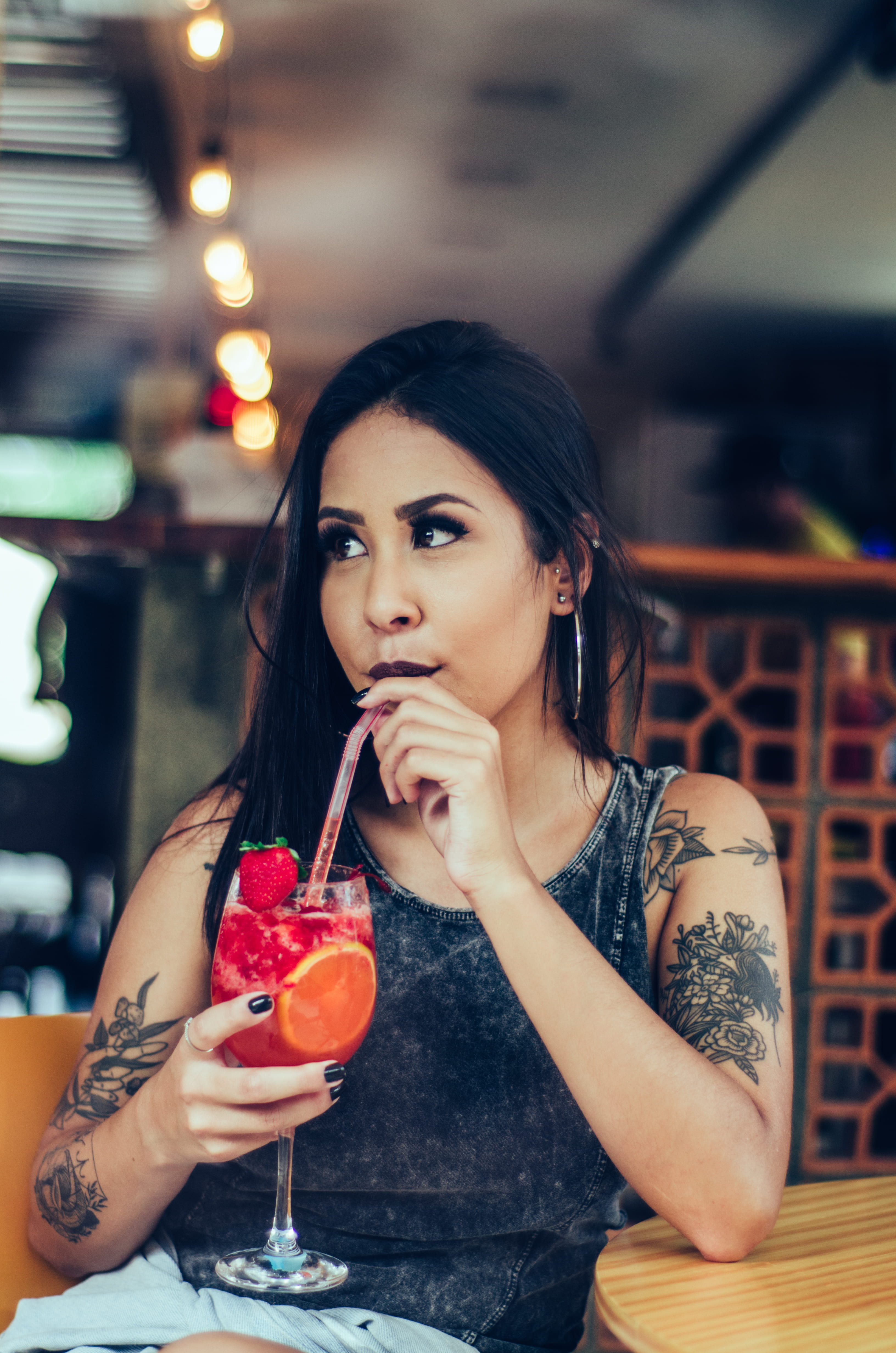 hair, portrait, sipping, looking away, leisure activity, fruit, tattoo, lifestyle, brazilian, cup, summer, cocktail, glass, lifestyles, hairstyle, indoors, Phone HD Wallpaper