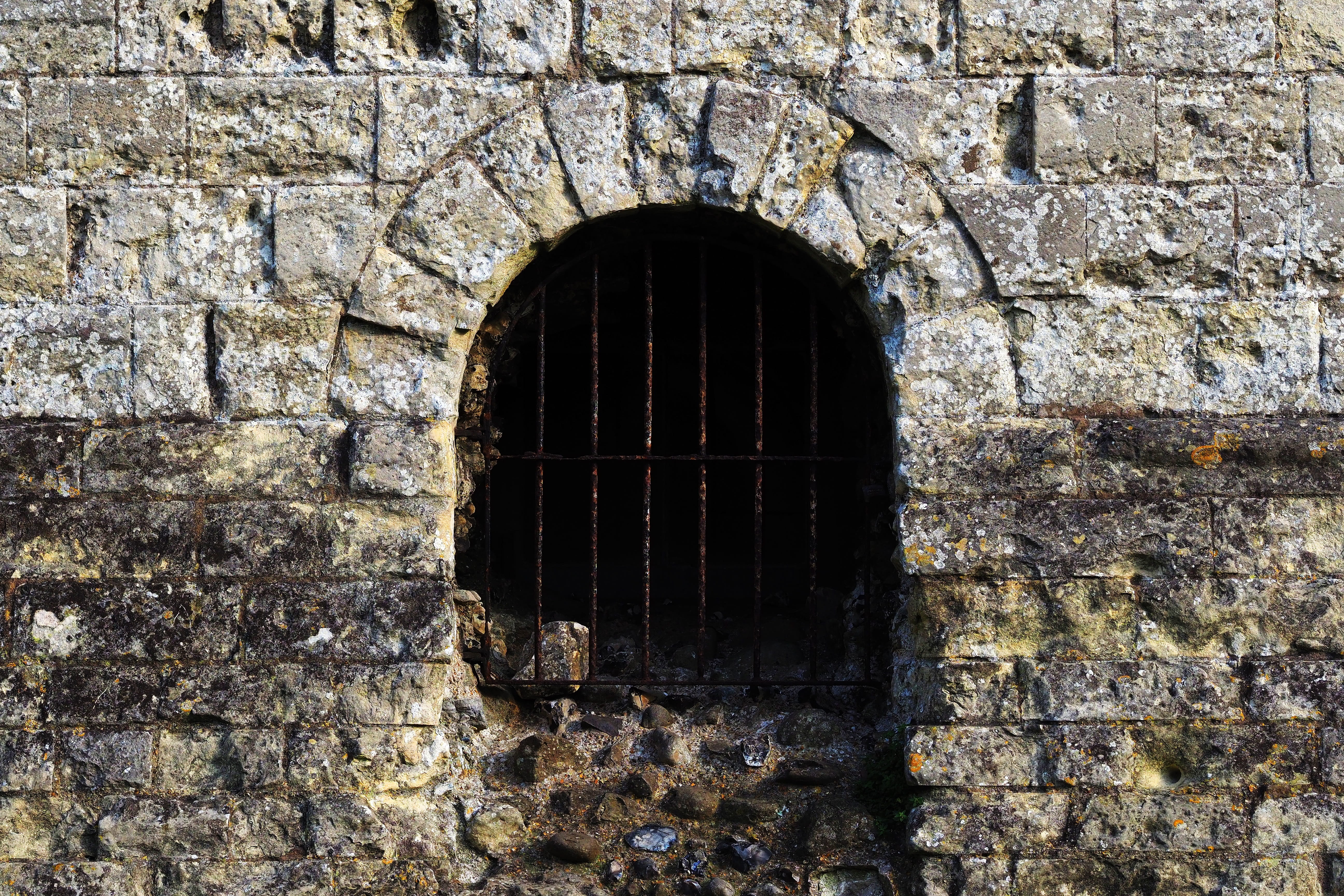grill, arch, architecture, window, no people, metal, adventure, passage, grate, day, geometric shape, prison, stone, unknown, dark, cave, building, 5K, HD Wallpaper