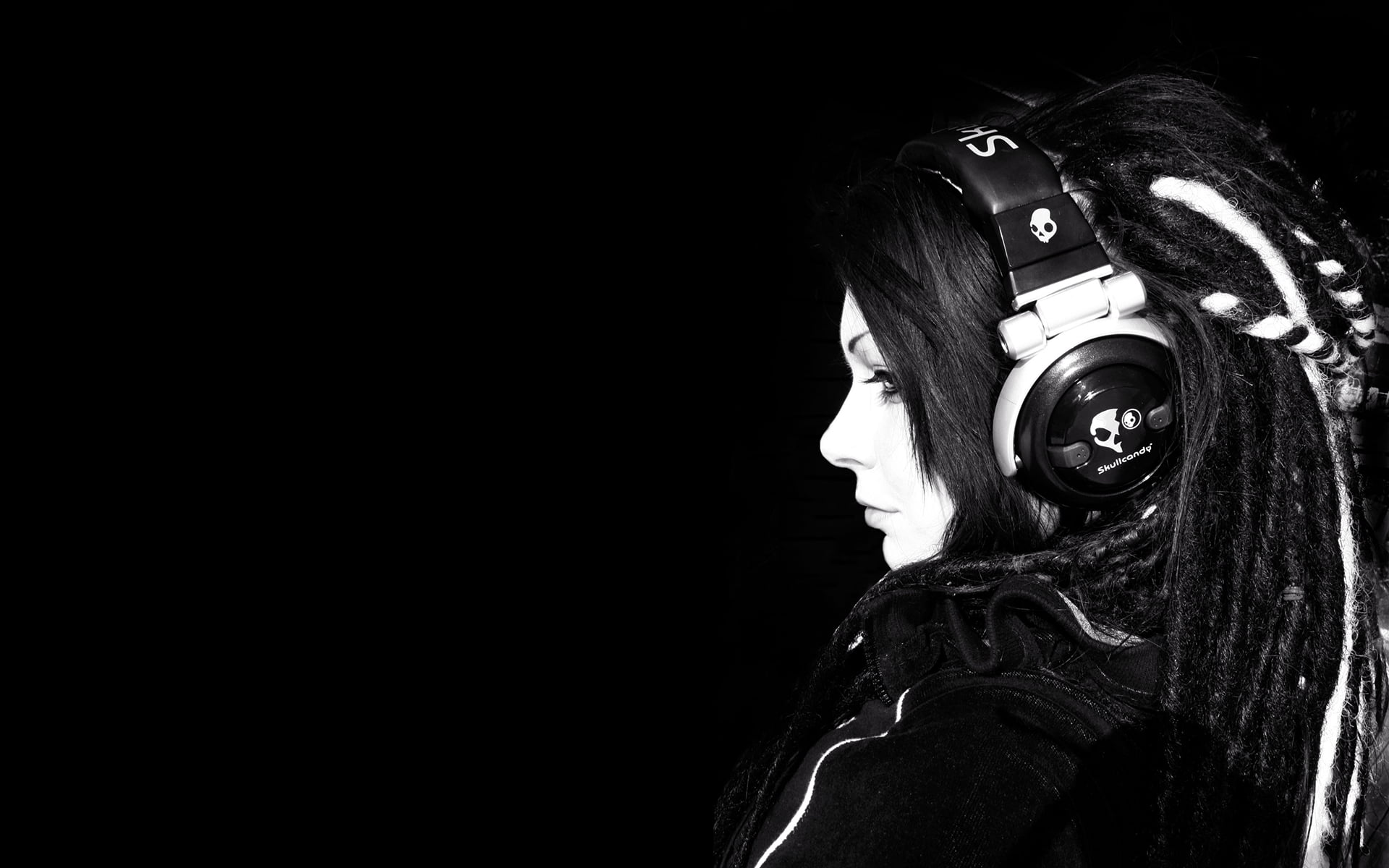 dreadlocks, black background, young women, monochrome, portrait, copy space, Skullcandy, looking at camera, top, real people, black, dark, leisure activity, HD Wallpaper
