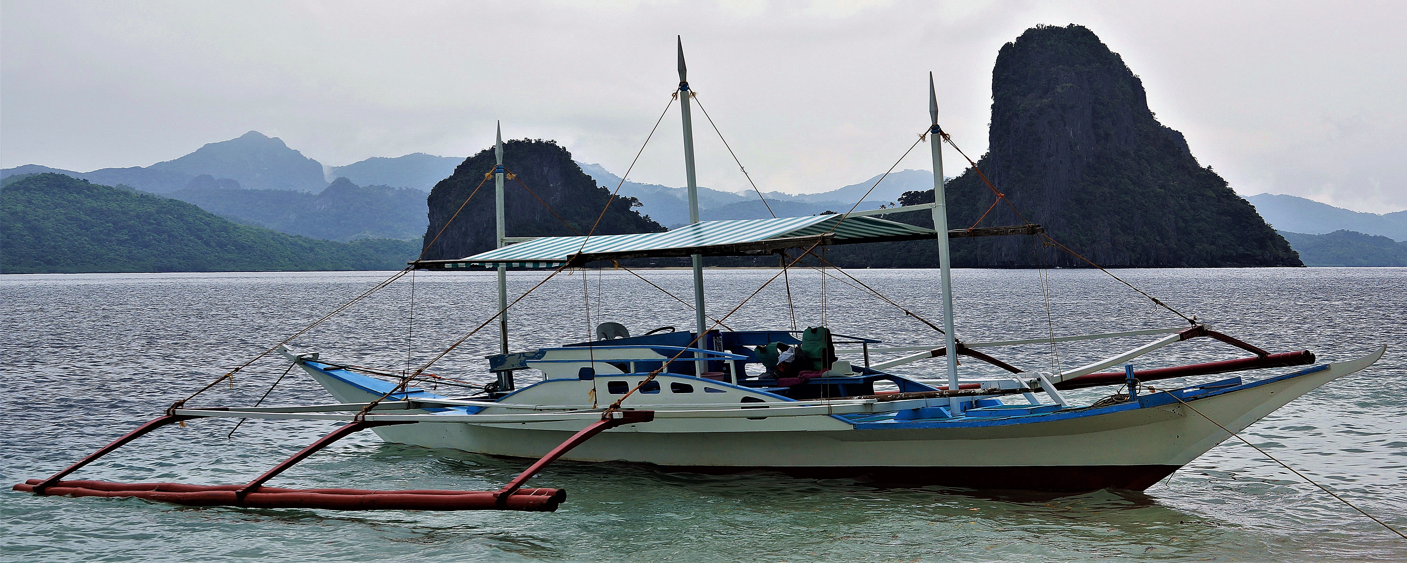 cloud - sky, island, travel, philippines, beauty in nature, fishing boat, nature, sea, mountain, boat, tourism, beach, 5K, el nido, sailboat, mode of transportation, HD Wallpaper